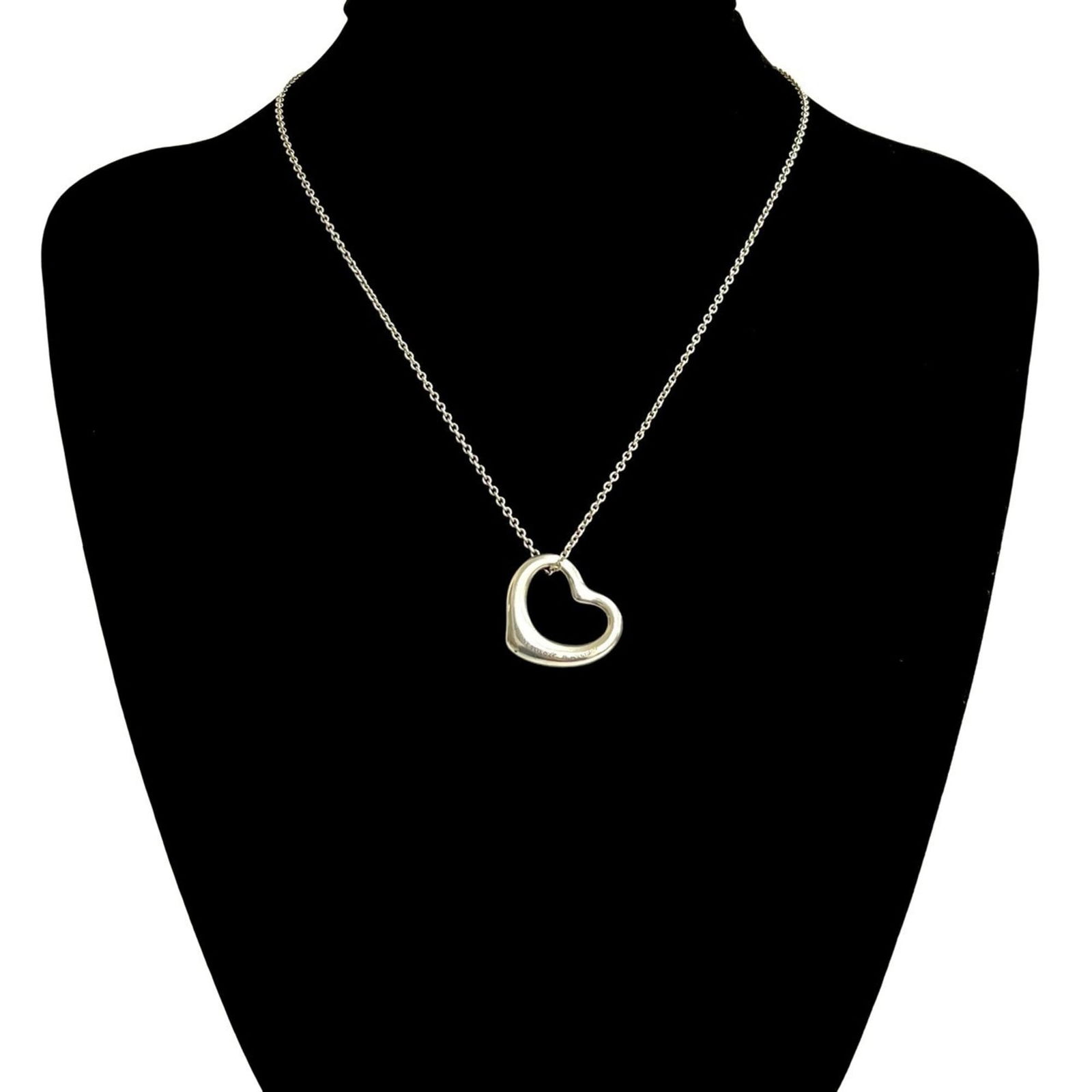 2075b TIFFANY & Co. Tiffany Open Heart Motif Sterling Silver 925 Necklace Pendant: 2075b TIFFANY & Co. Tiffany Open Heart Motif Sterling Silver 925 Necklace Pendant This listing features 2075b TIFFANY & Co. Tiffany Open Heart Motif Sterling Silver 925 Necklace Pendant. Item specific