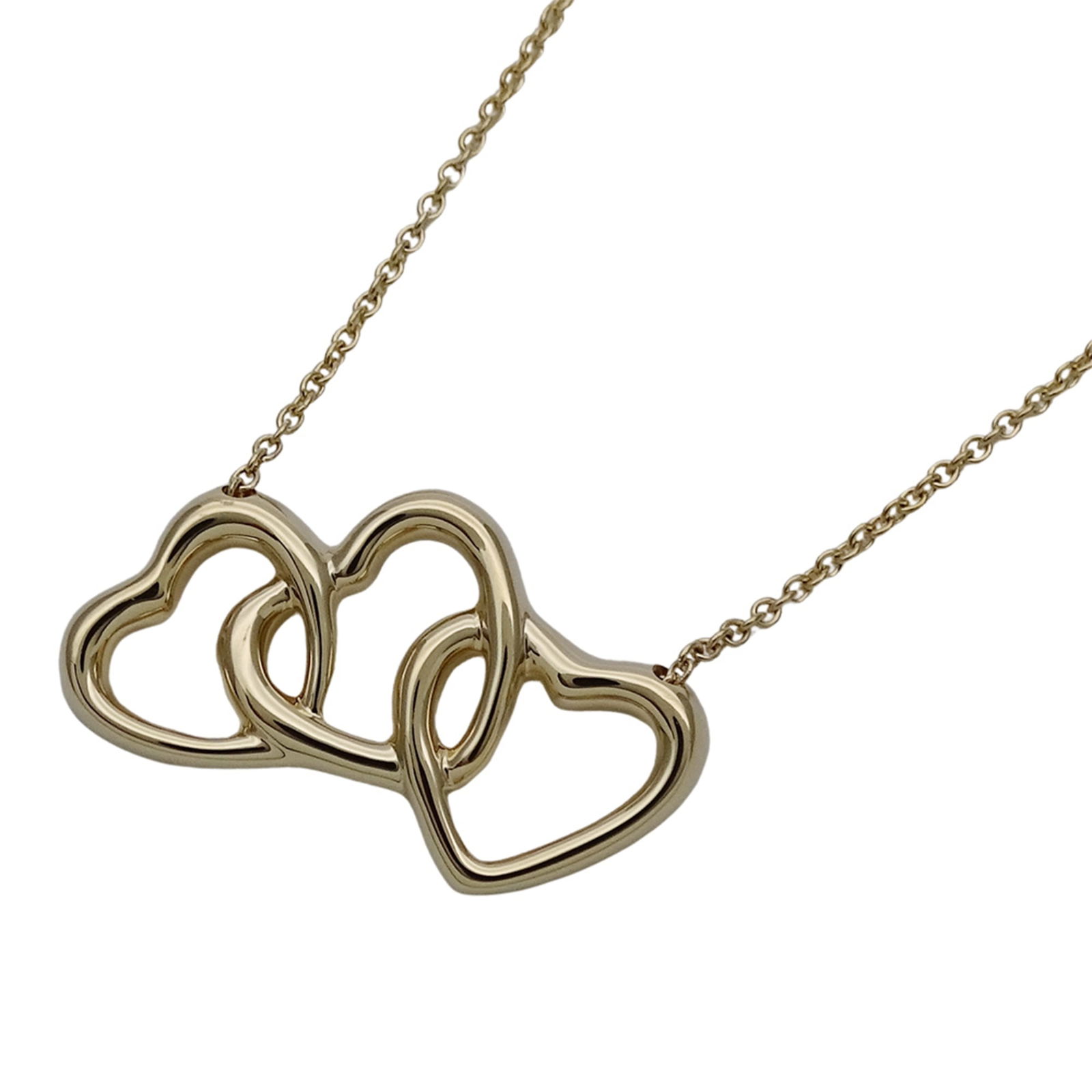 Polished - Tiffany & Co. Women's Necklace - Brand Pendant - 750YG Triple Heart - Yellow Gold: Polished - Tiffany & Co. Women's Necklace - Brand Pendant - 750YG Triple Heart - Yellow Gold This listing features Polished - Tiffany & Co. Women's Necklace - Brand Pendant - 750YG Triple Heart - Yell