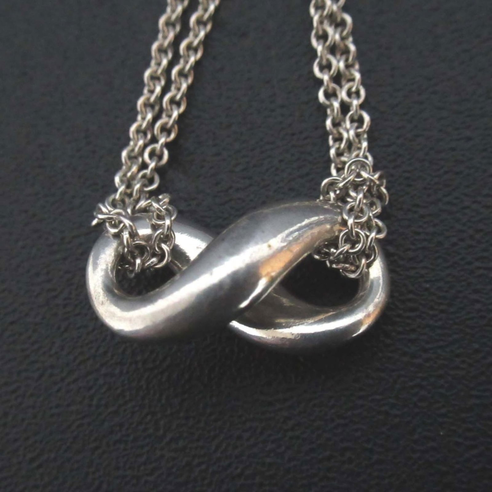 Women's Tiffany & Co. Infinity Necklace 925SV Silver: Women's Tiffany & Co. Infinity Necklace 925SV Silver This listing features Women's Tiffany & Co. Infinity Necklace 925SV Silver. Item specifics are provided below. Item Specifics: Brand: Tiffany
