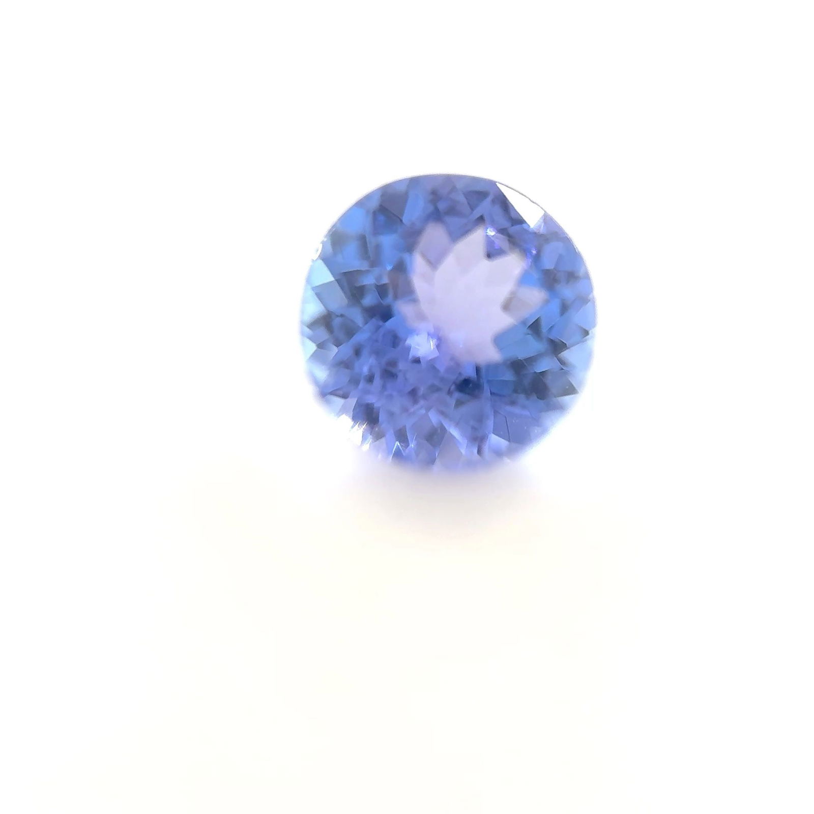 Loose Tanzanite Gemstone - Round 1.43ct Blue EC: Loose Tanzanite Gemstone - Round 1.43ct Blue EC This listing features Loose Tanzanite Gemstone - Round 1.43ct Blue EC. Item specifics are provided below. Item Specifics: Type: Tanzanite Carat: 1.43 Cu