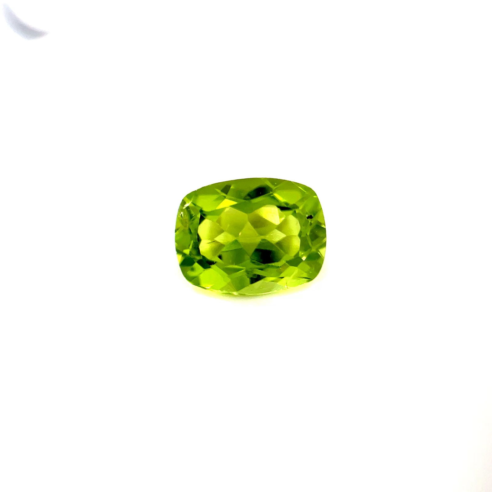 Loose Peridot Gemstone - Radiant 2.12ct Green EC: Loose Peridot Gemstone - Radiant 2.12ct Green EC This listing features Loose Peridot Gemstone - Radiant 2.12ct Green EC. Item specifics are provided below. Item Specifics: Type: Peridot Carat: 2.12