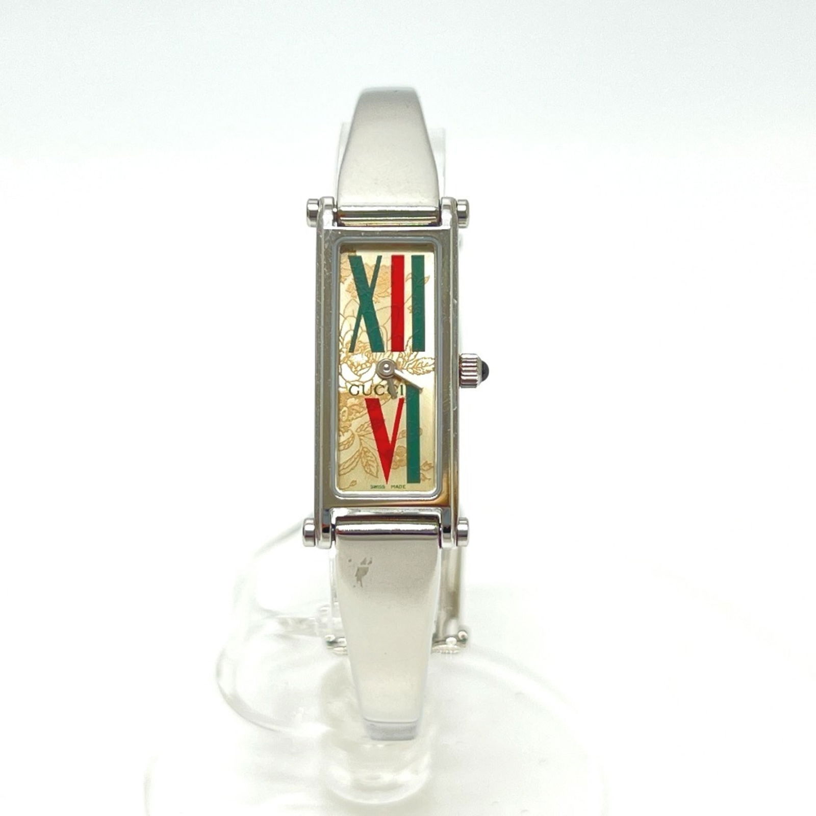 Wristwatch Gucci: Wristwatch Gucci This listing features Wristwatch Gucci. Item specifics are provided below. Item Specifics: Brand: Gucci Type: Wristwatch Gender: Women Material (Case): Stainless Steel Material (Band)