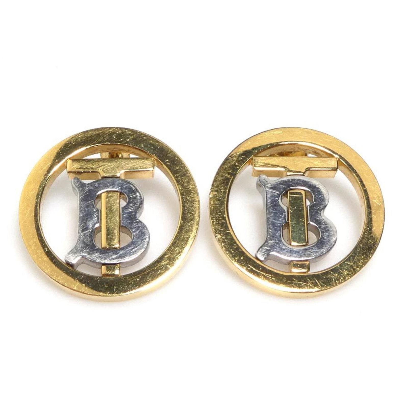 Metal Burberry Stud Earrings: Metal Burberry Stud Earrings This listing features Metal Burberry Stud Earrings. Item specifics are provided below. Item Specifics: Brand: Burberry Type: Stud Earrings Gender: Women Material: Metal Co