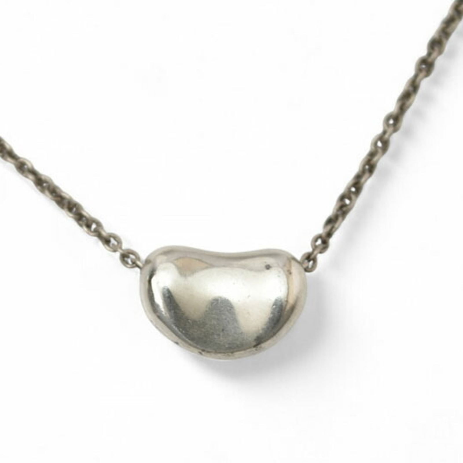 0.9cm Wide - Tiffany & Co. Elsa Peretti Bean Motif Pendant in Silver: 0.9cm Wide - Tiffany & Co. Elsa Peretti Bean Motif Pendant in Silver This listing features 0.9cm Wide - Tiffany & Co. Elsa Peretti Bean Motif Pendant in Silver. Item specifics are provided below. Item