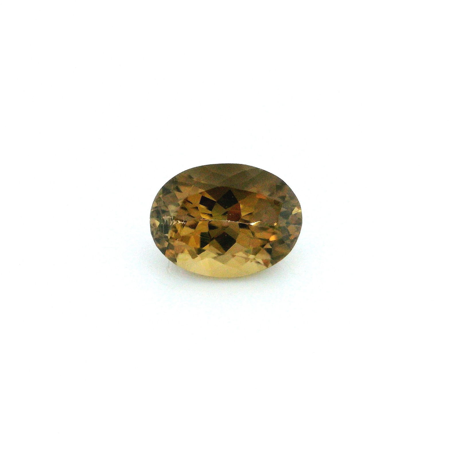 Loose Tourmaline Gemstone - GSI Oval 1.7ct Brown SI: Loose Tourmaline Gemstone - GSI Oval 1.7ct Brown SI This listing features Loose Tourmaline Gemstone - GSI Oval 1.7ct Brown SI. Item specifics are provided below. Item Specifics: Type: Tourmaline