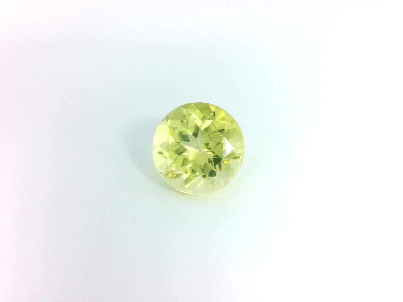 Loose Apatite Gemstone - GSI Round 2.46ct Yellow EC: Loose Apatite Gemstone - GSI Round 2.46ct Yellow EC This listing features Loose Apatite Gemstone - GSI Round 2.46ct Yellow EC. Item specifics are provided below. Item Specifics: Type: Apatite Carat: