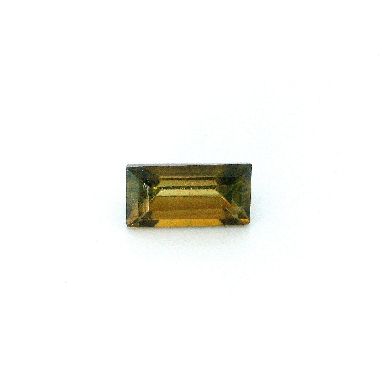 Loose Tourmaline Gemstone - GSI Rectangular 1.35ct Brown SI: Loose Tourmaline Gemstone - GSI Rectangular 1.35ct Brown SI This listing features Loose Tourmaline Gemstone - GSI Rectangular 1.35ct Brown SI. Item specifics are provided below. Item Specifics: Type: