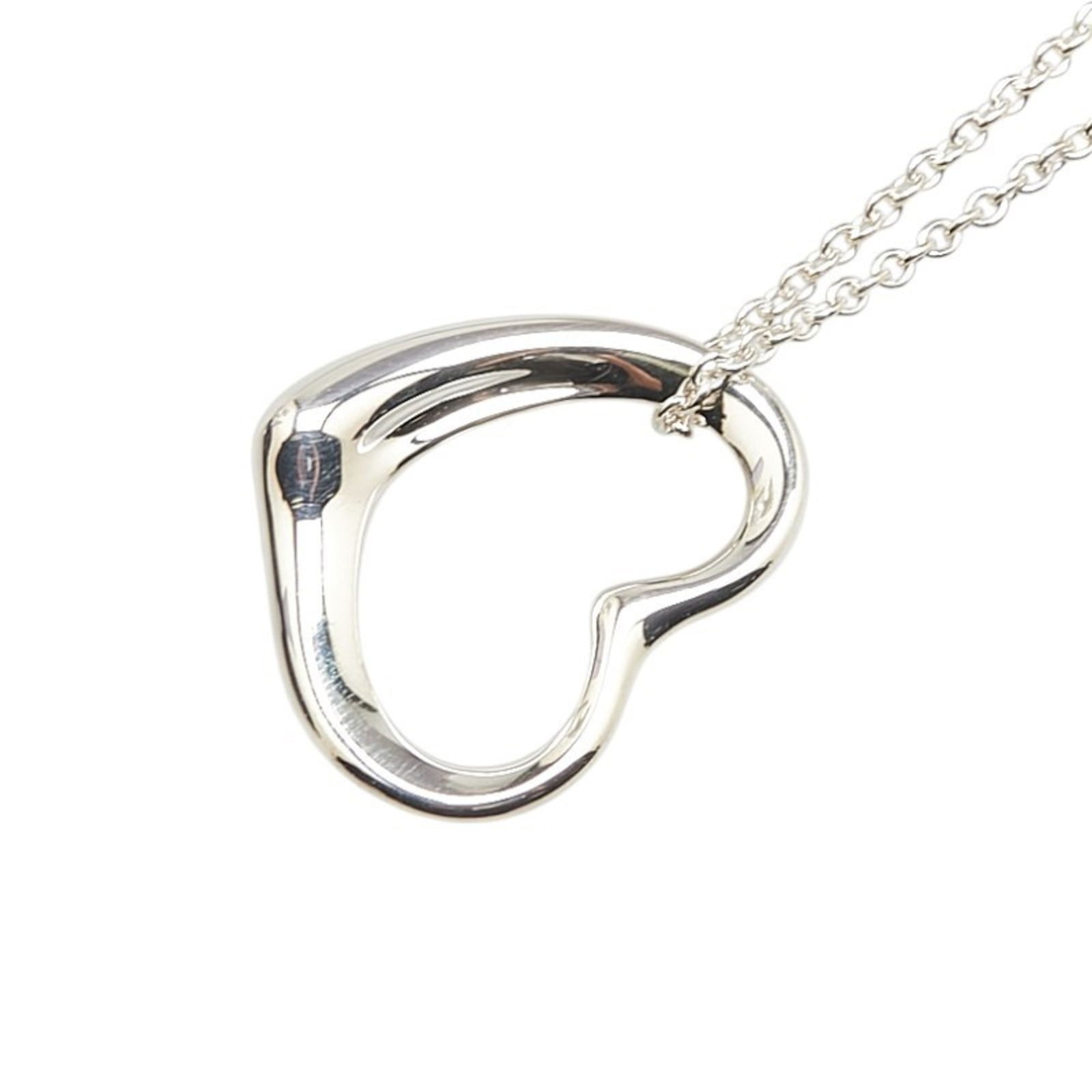 Co. Tiffany Elsa Peretti Open Heart Necklace in 925 Sterling Silver for Women. TIFFANY &: Co. Tiffany Elsa Peretti Open Heart Necklace in 925 Sterling Silver for Women. TIFFANY & This listing features Co. Tiffany Elsa Peretti Open Heart Necklace in 925 Sterling Silver for Women. TIFFANY &.