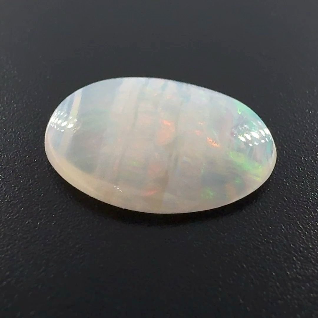 Loose Opal Gemstone - Oval 2.67ct White EC: Loose Opal Gemstone - Oval 2.67ct White EC This listing features Loose Opal Gemstone - Oval 2.67ct White EC. Item specifics are provided below. Item Specifics: Type: Opal Carat: 2.67 Cut: Cabochon