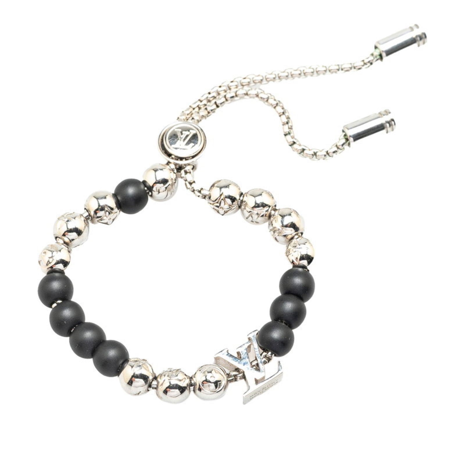 Metal Louis Vuitton Charm Bracelet: Metal Louis Vuitton Charm Bracelet This listing features Metal Louis Vuitton Charm Bracelet. Item specifics are provided below. Item Specifics: Brand: Louis Vuitton Type: Charm Bracelet Gender: Women