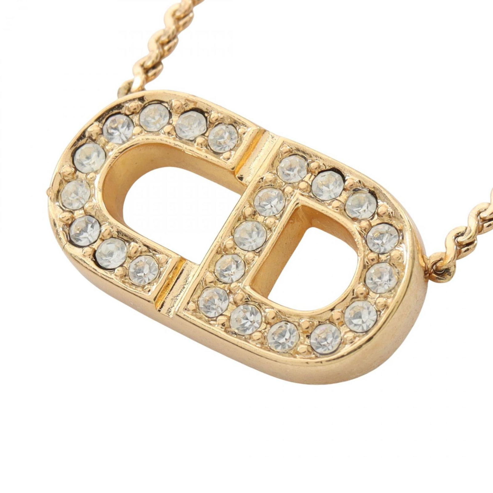 available in gold and clear. - Christian Dior CD logo necklace with gold-plated rhinestones: available in gold and clear. - Christian Dior CD logo necklace with gold-plated rhinestones This listing features available in gold and clear. - Christian Dior CD logo necklace with gold-plated rhines