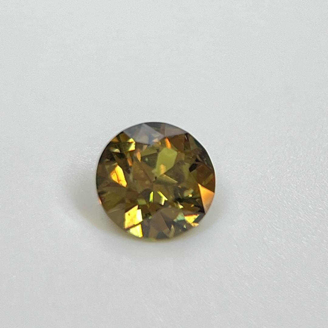 Loose Garnet Gemstone - Round 1.61ct Green SI: Loose Garnet Gemstone - Round 1.61ct Green SI This listing features Loose Garnet Gemstone - Round 1.61ct Green SI. Item specifics are provided below. Item Specifics: Type: Garnet Carat: 1.61 Cut: