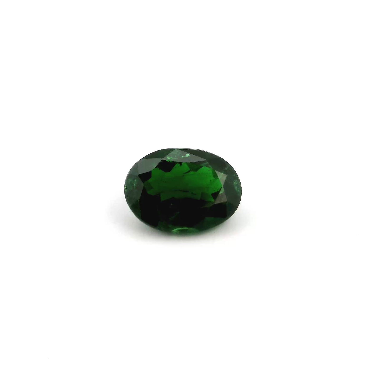 Loose Garnet Gemstone - GSI Oval 1.44ct Green SI: Loose Garnet Gemstone - GSI Oval 1.44ct Green SI This listing features Loose Garnet Gemstone - GSI Oval 1.44ct Green SI. Item specifics are provided below. Item Specifics: Type: Garnet Carat: 1.44 Cut