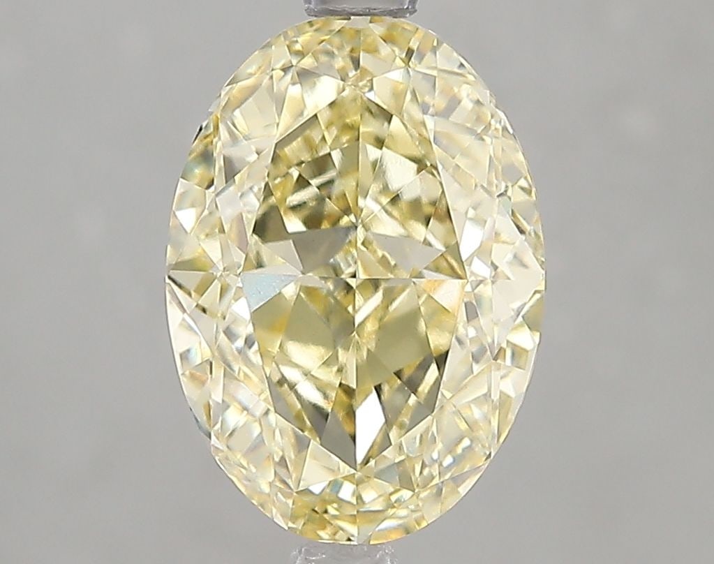 Loose Lab Diamond - IGI Oval 3.09ct Fancy Yellow VVS2: Loose Lab Diamond - IGI Oval 3.09ct Fancy Yellow VVS2 This listing features Loose Lab Diamond - IGI Oval 3.09ct Fancy Yellow VVS2. Item specifics are provided below. Item Specifics: Source: This Is