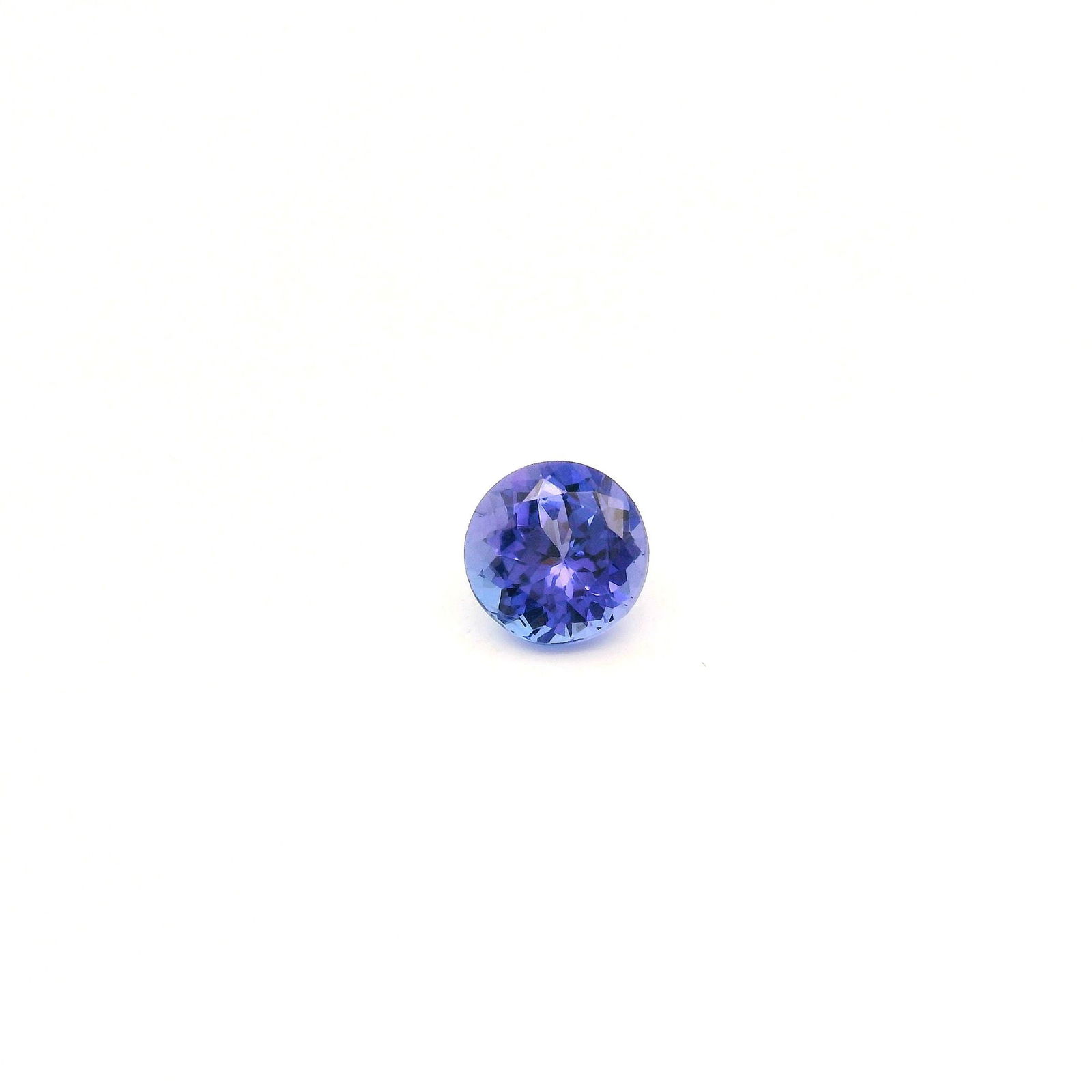 Loose Tanzanite Gemstone - GSI Round 1.23ct Blue EC: Loose Tanzanite Gemstone - GSI Round 1.23ct Blue EC This listing features Loose Tanzanite Gemstone - GSI Round 1.23ct Blue EC. Item specifics are provided below. Item Specifics: Type: Tanzanite Carat: