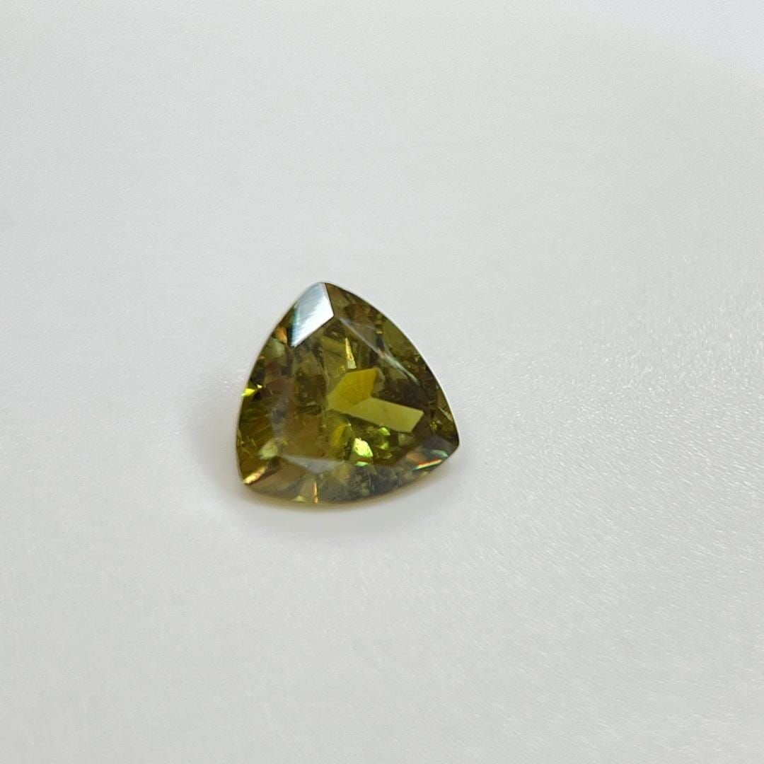 Loose Garnet Gemstone - Trilliant 2.09ct Green SI: Loose Garnet Gemstone - Trilliant 2.09ct Green SI This listing features Loose Garnet Gemstone - Trilliant 2.09ct Green SI. Item specifics are provided below. Item Specifics: Type: Garnet Carat: 2.09 C