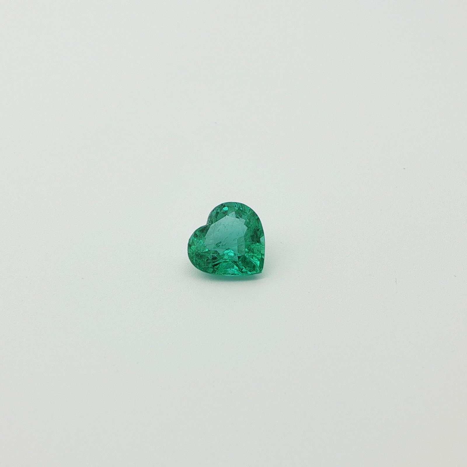 Loose Emerald Gemstone - GSI Heart 1.23ct Green MI: Loose Emerald Gemstone - GSI Heart 1.23ct Green MI This listing features Loose Emerald Gemstone - GSI Heart 1.23ct Green MI. Item specifics are provided below. Item Specifics: Type: Emerald Carat: 1.2