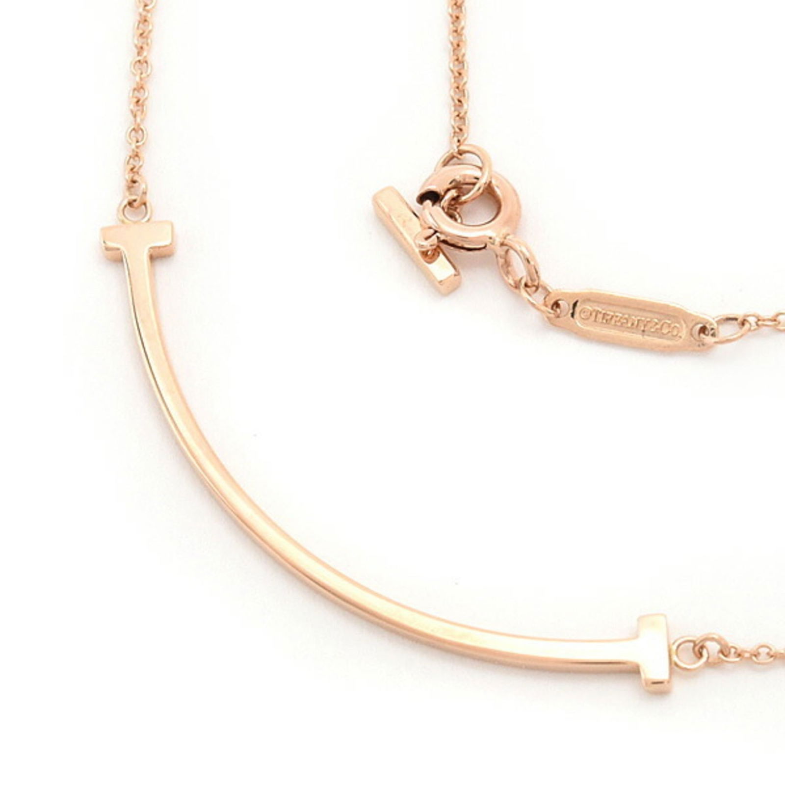 TIFFANY Women's T Smile Small Necklace in Pink Gold 750PG: TIFFANY Women's T Smile Small Necklace in Pink Gold 750PG This listing features TIFFANY Women's T Smile Small Necklace in Pink Gold 750PG. Item specifics are provided below. Item Specifics: Brand: