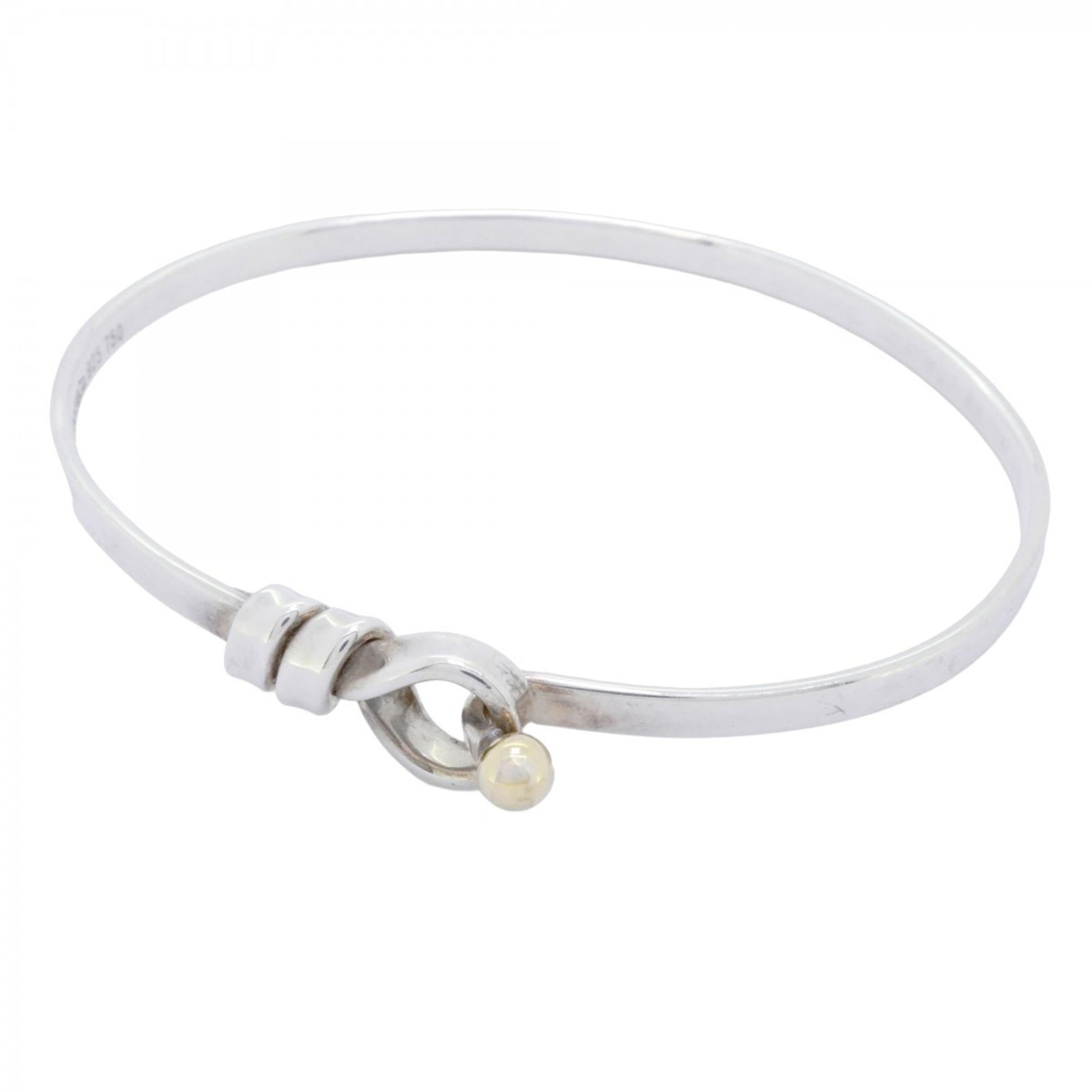 Yellow Gold (18K) - Tiffany Bangle Silver 925: Yellow Gold (18K) - Tiffany Bangle Silver 925 This listing features Yellow Gold (18K) - Tiffany Bangle Silver 925. Item specifics are provided below. Item Specifics: Brand: Tiffany Type: Bangle Gender