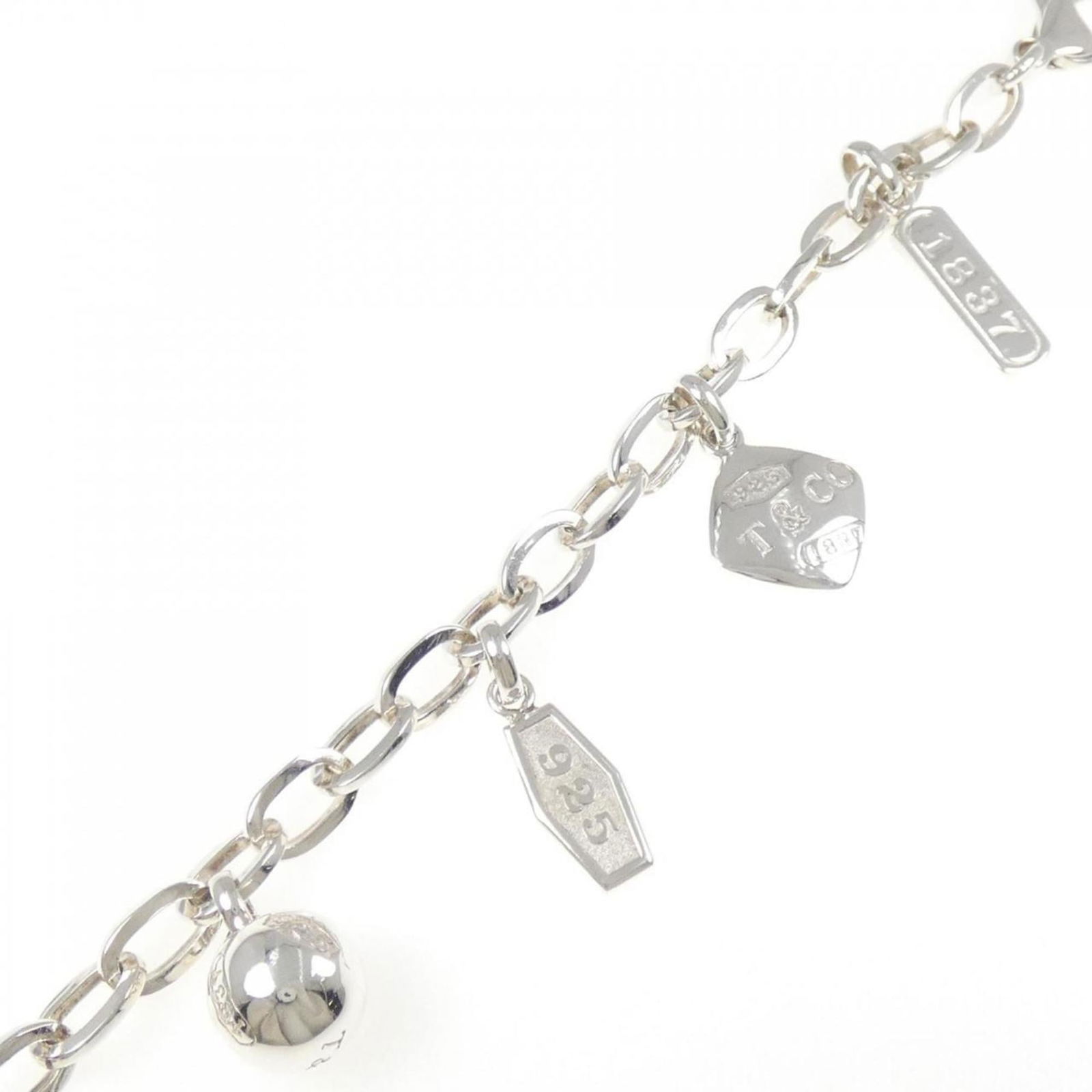 925 Tiffany Charm Bracelet Silver: 925 Tiffany Charm Bracelet Silver This listing features 925 Tiffany Charm Bracelet Silver. Item specifics are provided below. Item Specifics: Brand: Tiffany Type: Charm Bracelet Gender: Women