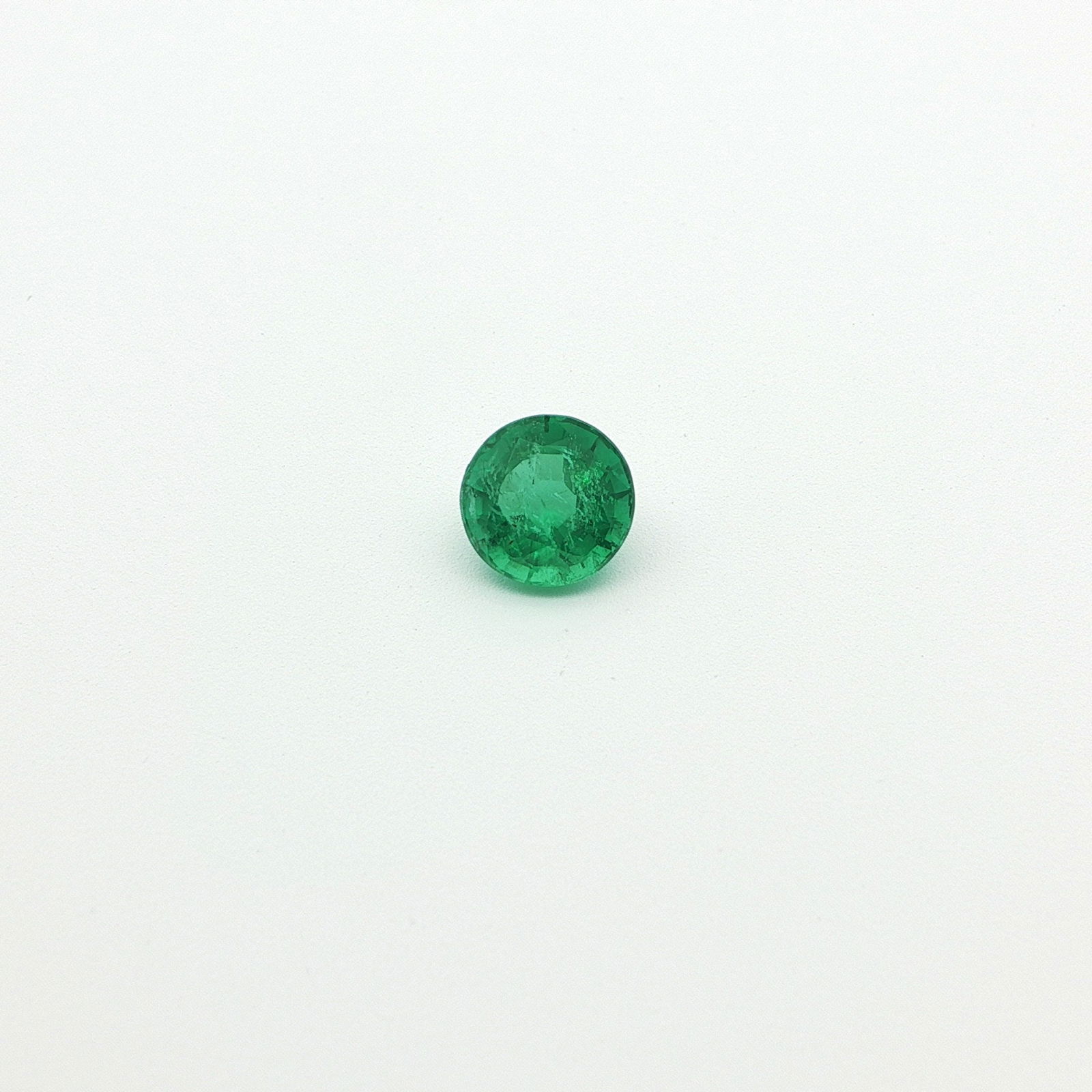 Loose Emerald Gemstone - GSI Round 1.01ct Green MI: Loose Emerald Gemstone - GSI Round 1.01ct Green MI This listing features Loose Emerald Gemstone - GSI Round 1.01ct Green MI. Item specifics are provided below. Item Specifics: Type: Emerald Carat: 1.0