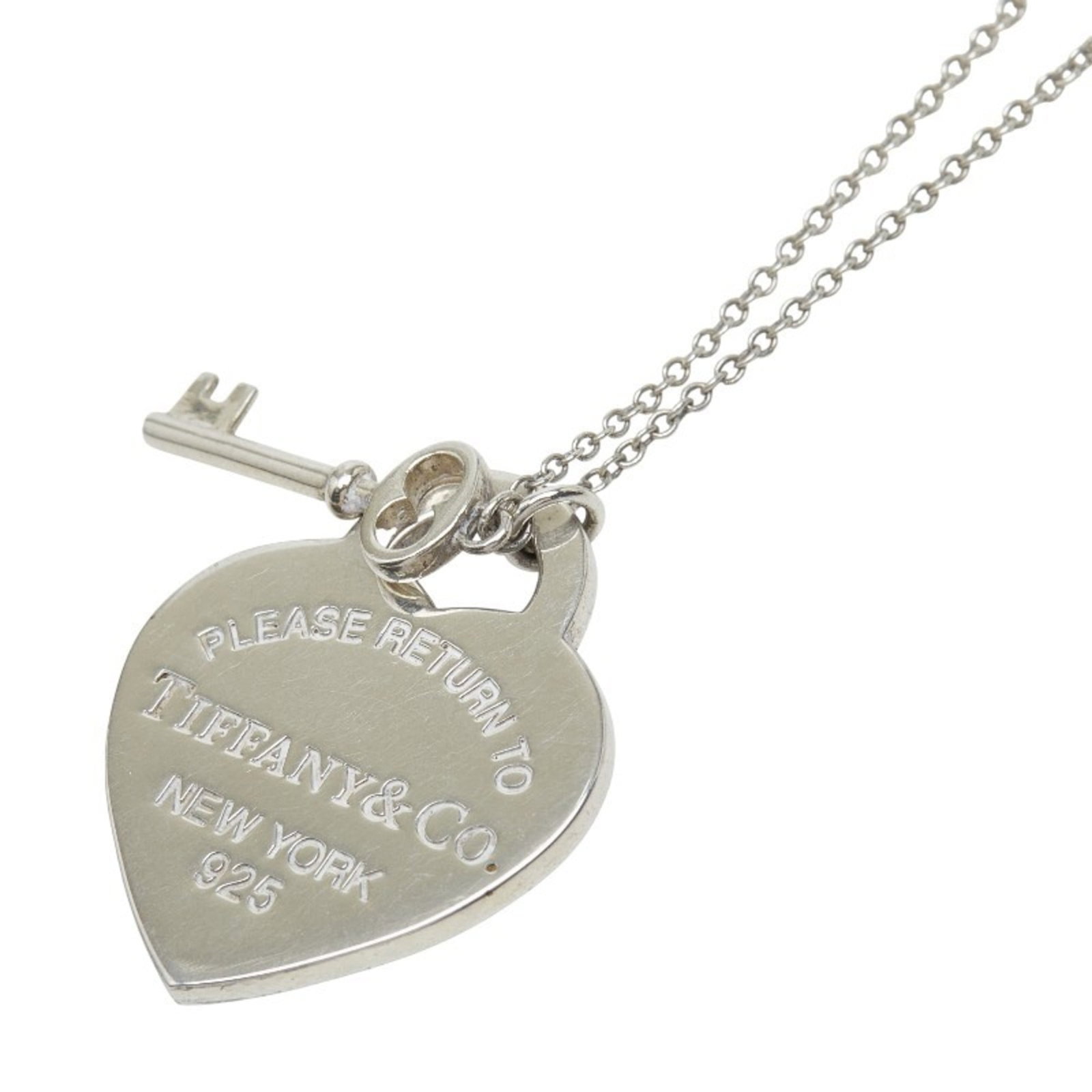 TIFFANY & Co. Return to Heart Tag Key Necklace in 925 Sterling Silver for Women.: TIFFANY & Co. Return to Heart Tag Key Necklace in 925 Sterling Silver for Women. This listing features TIFFANY & Co. Return to Heart Tag Key Necklace in 925 Sterling Silver for Women.. Item specifics