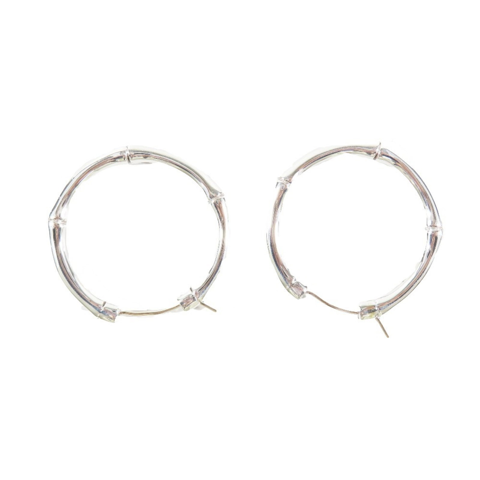 925 Gucci Hoop Earrings Silver: 925 Gucci Hoop Earrings Silver This listing features 925 Gucci Hoop Earrings Silver. Item specifics are provided below. Item Specifics: Brand: Gucci Type: Hoop Earrings Gender: Women Material: Silver