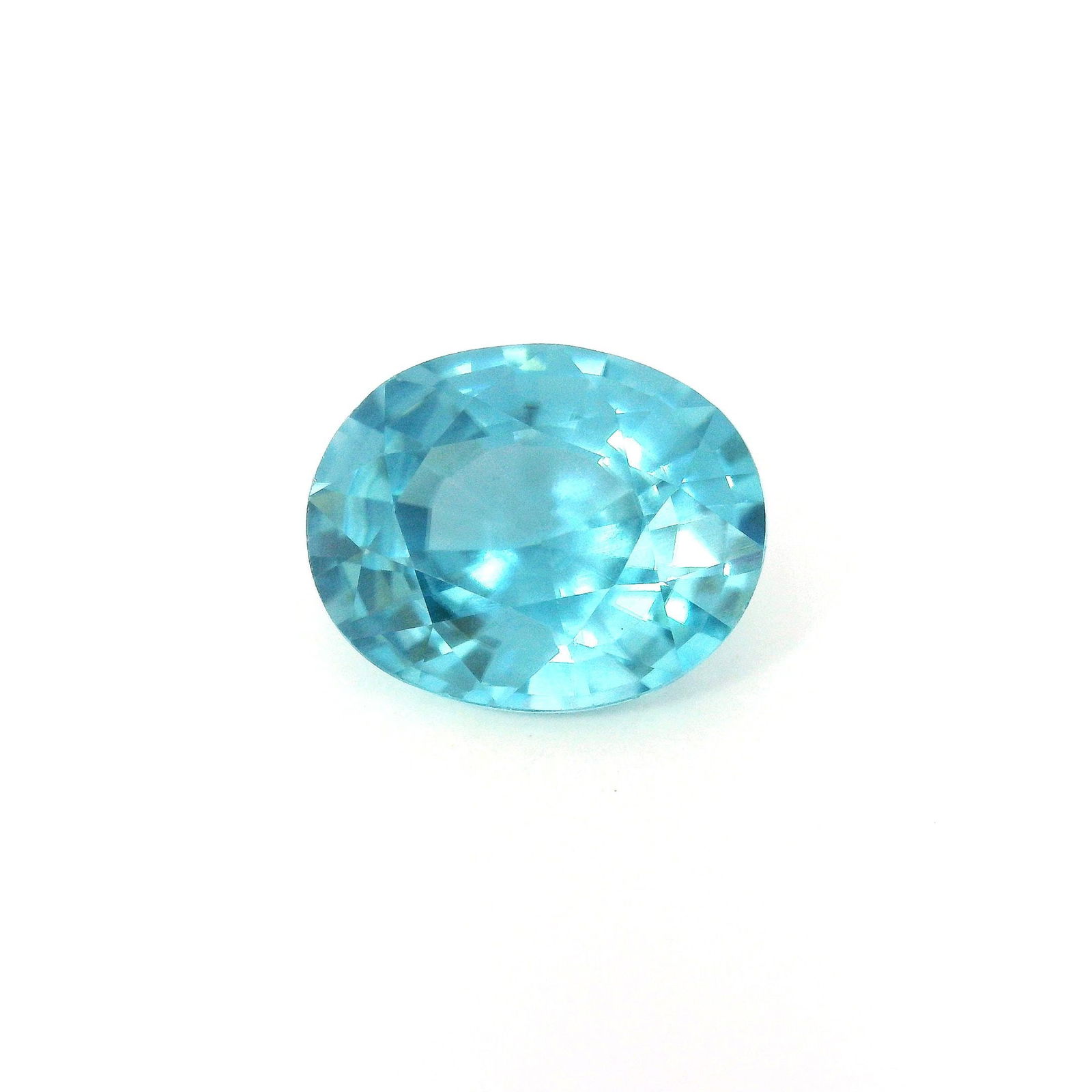 Loose Zircon Gemstone - IGI Oval 4.63ct Blue EC: Loose Zircon Gemstone - IGI Oval 4.63ct Blue EC This listing features Loose Zircon Gemstone - IGI Oval 4.63ct Blue EC. Item specifics are provided below. Item Specifics: Type: Zircon Carat: 4.63 Cut: