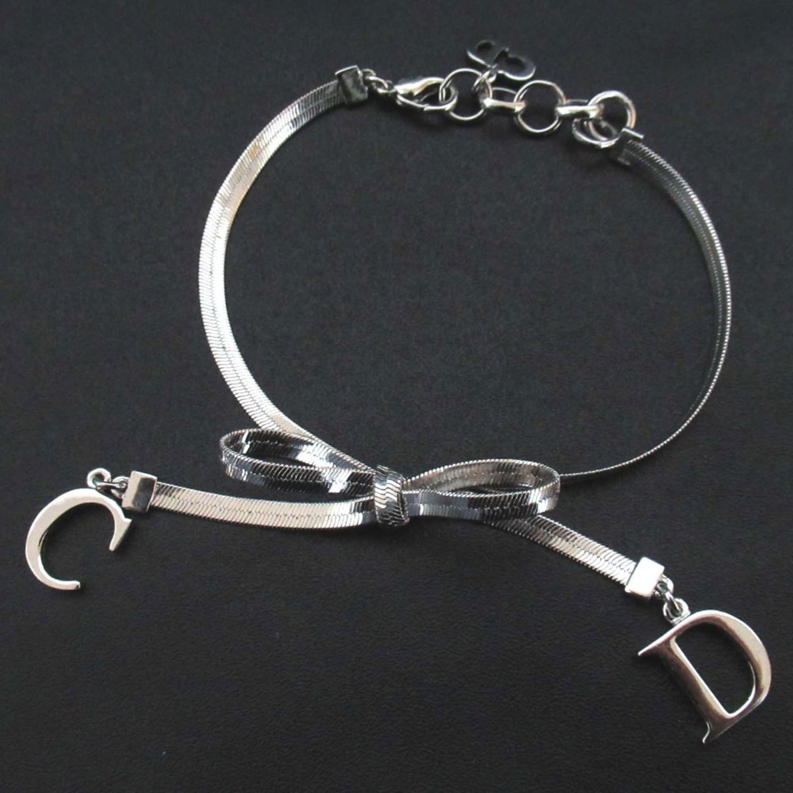 Bracelet Christian Dior Charm: Bracelet Christian Dior Charm This listing features Bracelet Christian Dior Charm. Item specifics are provided below. Item Specifics: Brand: Christian Dior Type: Charm Bracelet Gender: Women Color: Si