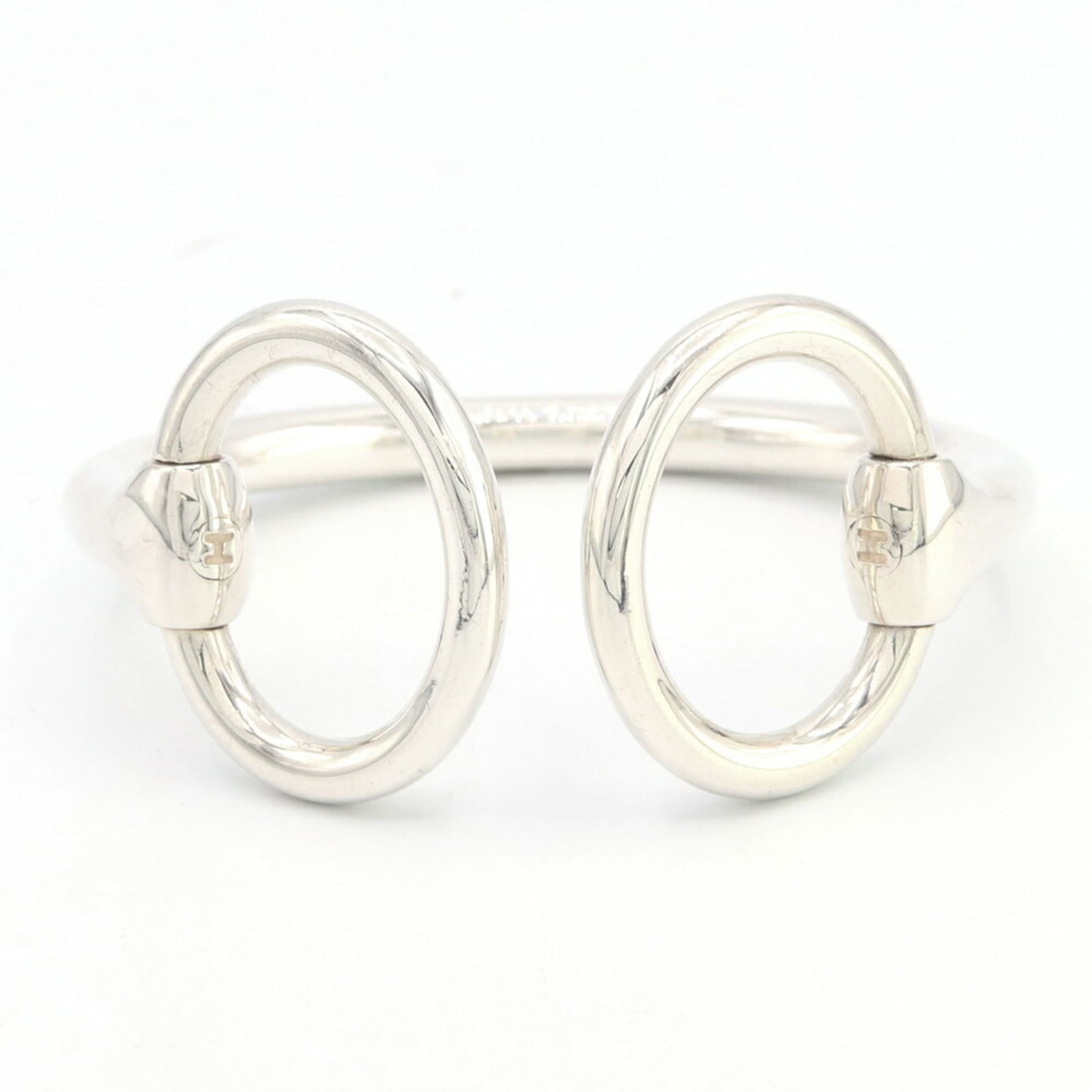 925 Hermes Bangle Sterling Silver: 925 Hermes Bangle Sterling Silver This listing features 925 Hermes Bangle Sterling Silver. Item specifics are provided below. Item Specifics: Brand: Hermes Type: Bangle Gender: Women Material: Sterlin