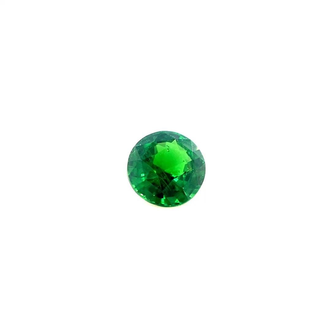 Loose Garnet Gemstone - Round 1.68ct Green SI: Loose Garnet Gemstone - Round 1.68ct Green SI This listing features Loose Garnet Gemstone - Round 1.68ct Green SI. Item specifics are provided below. Item Specifics: Type: Garnet Carat: 1.68 Cut: Face
