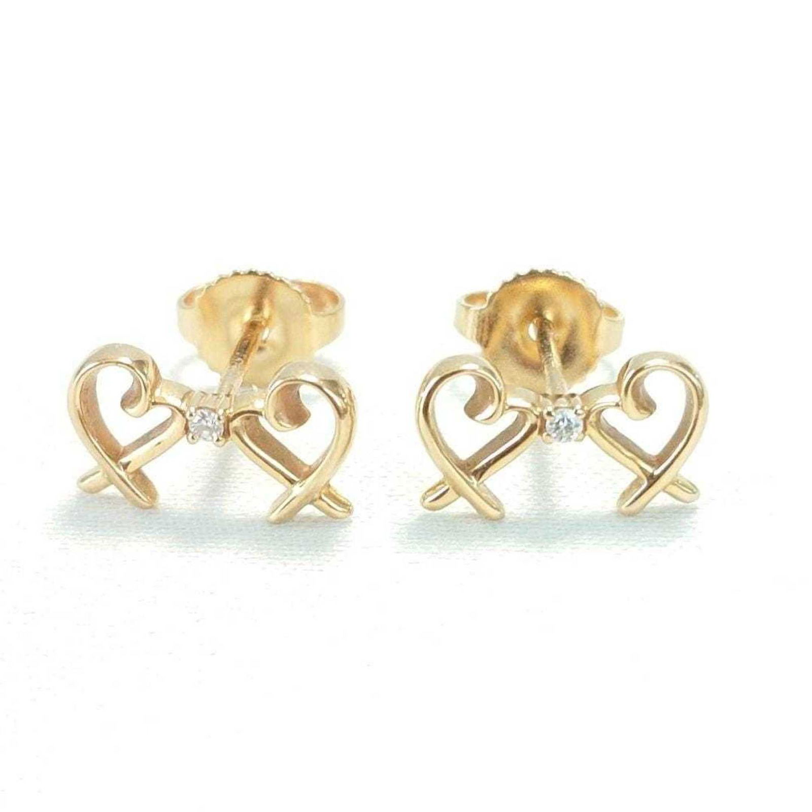 (18K) Tiffany Stud Earrings Yellow Gold: (18K) Tiffany Stud Earrings Yellow Gold This listing features (18K) Tiffany Stud Earrings Yellow Gold. Item specifics are provided below. Item Specifics: Brand: Tiffany Type: Stud Earrings Gender: Men