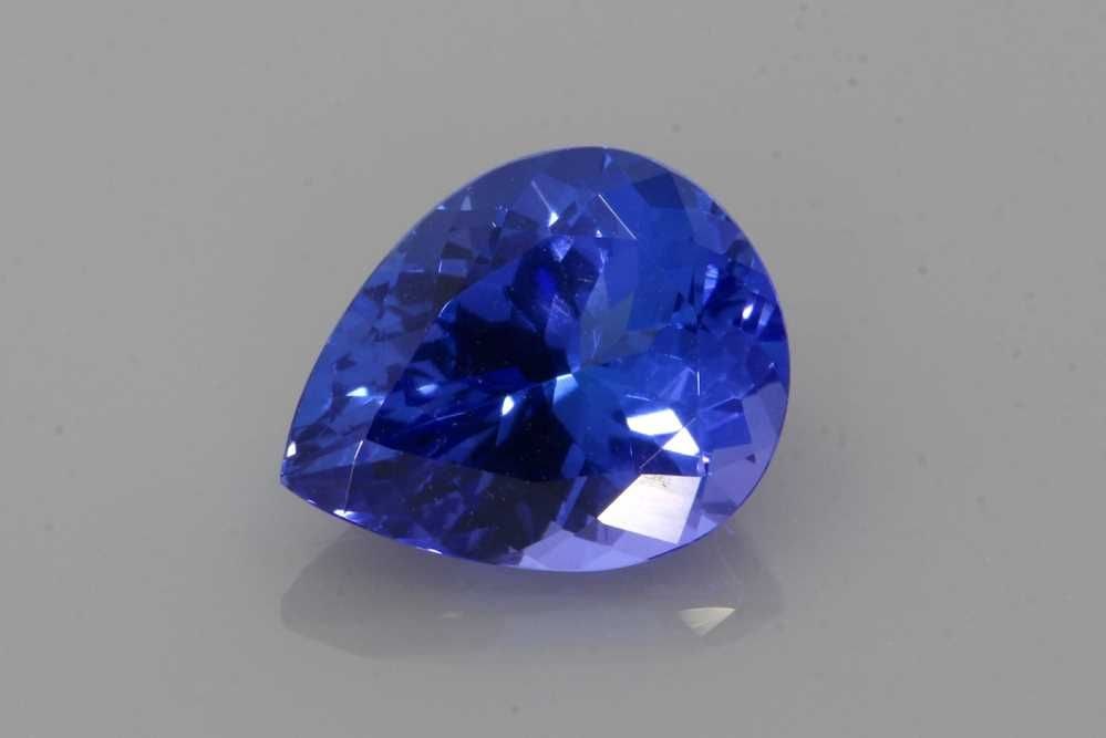 Loose Tanzanite Gemstone - Pear 2.55ct Purple EC: Loose Tanzanite Gemstone - Pear 2.55ct Purple EC This listing features Loose Tanzanite Gemstone - Pear 2.55ct Purple EC. Item specifics are provided below. Item Specifics: Type: Tanzanite Carat: 2.55