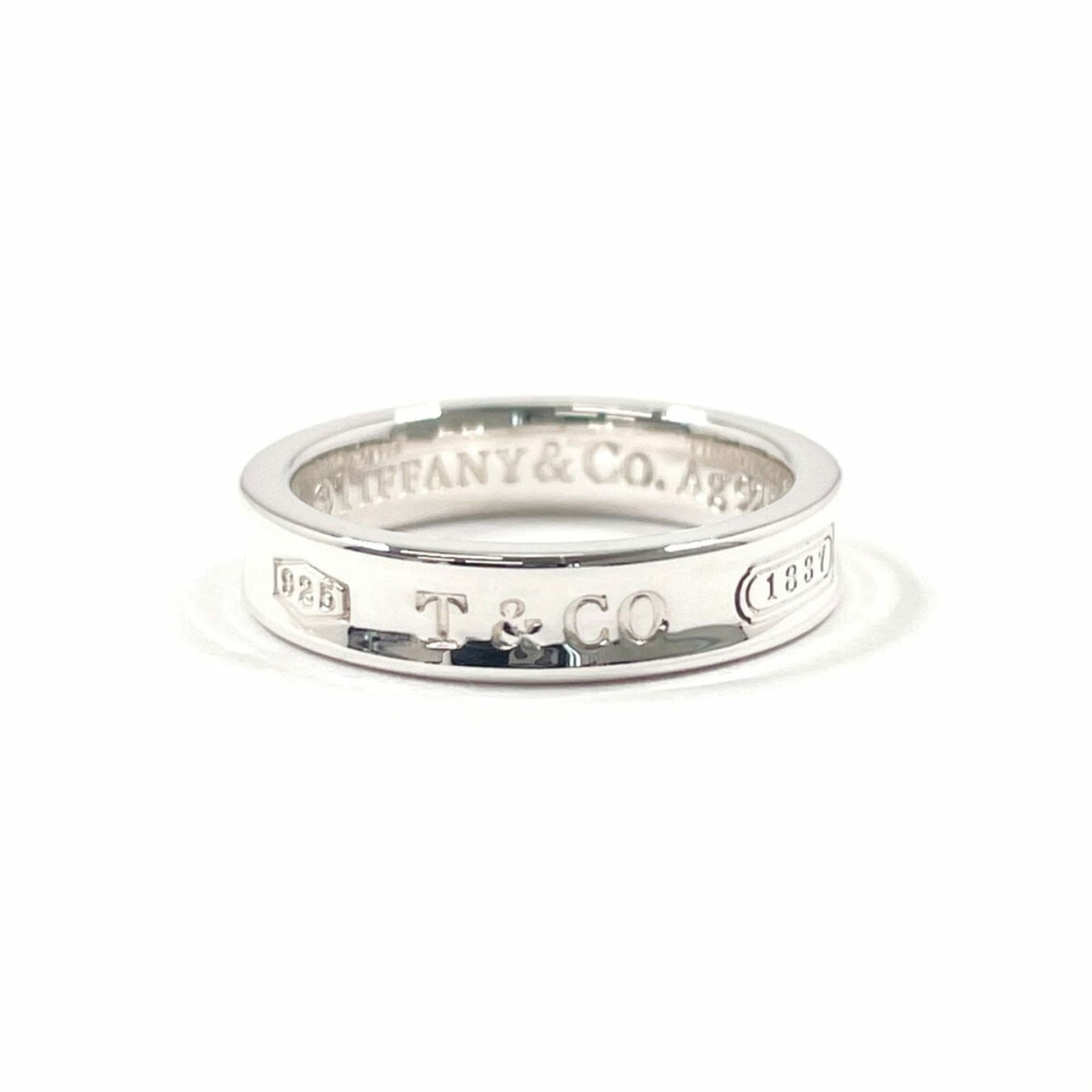 925 Tiffany Band Ring Silver: 925 Tiffany Band Ring Silver This listing features 925 Tiffany Band Ring Silver. Item specifics are provided below. Item Specifics: Brand: Tiffany Type: Band Ring Gender: Women Color: Silver Material: