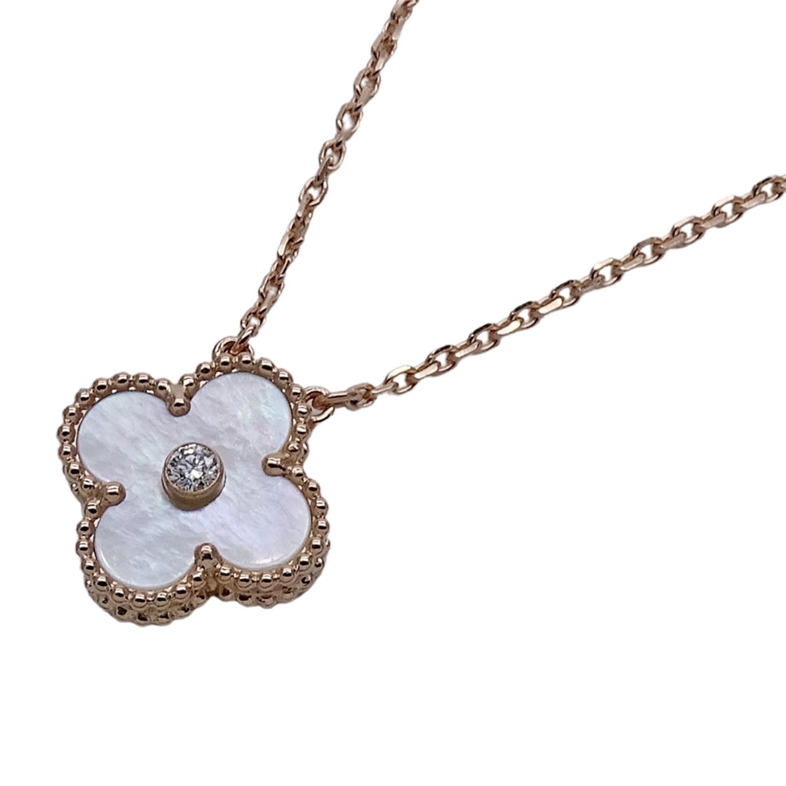 Polished - Van Cleef & Arpels Vintage Alhambra Necklace for Women - 2012 Christmas Limited Edition: Polished - Van Cleef & Arpels Vintage Alhambra Necklace for Women - 2012 Christmas Limited Edition - Holiday - 750PG Mother-of-Pearl with One Diamond - Pink Gold This listing features Polished - Van C