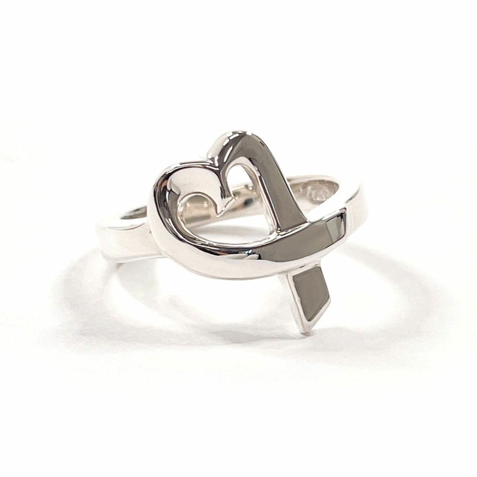 925 Tiffany Band Ring Silver: 925 Tiffany Band Ring Silver This listing features 925 Tiffany Band Ring Silver. Item specifics are provided below. Item Specifics: Brand: Tiffany Type: Band Ring Gender: Women Color: Silver Material: