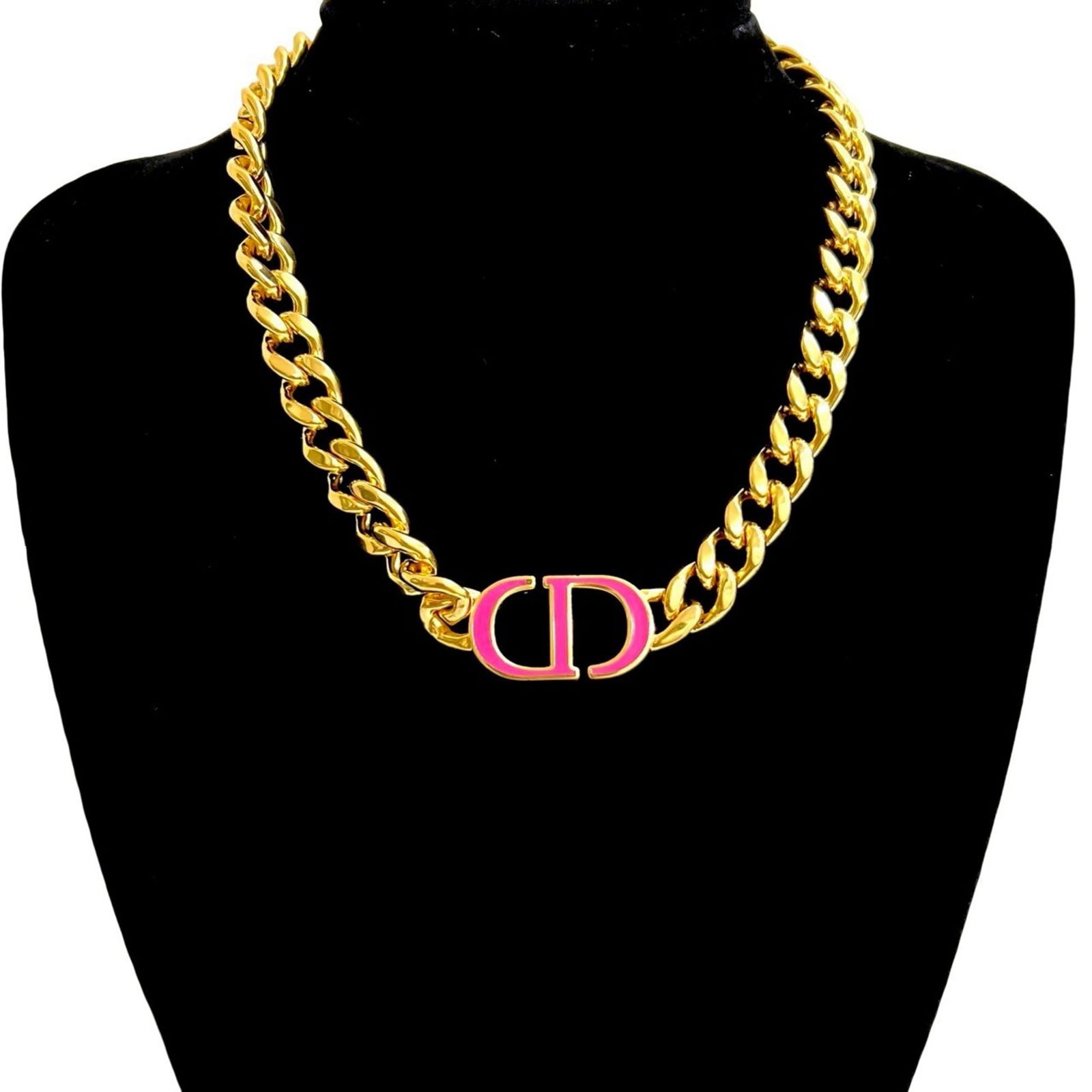 (09185) Christian Dior CD logo motif GP chain necklace pendant in gold and pink: (09185) Christian Dior CD logo motif GP chain necklace pendant in gold and pink This listing features (09185) Christian Dior CD logo motif GP chain necklace pendant in gold and pink. Item specifics ar