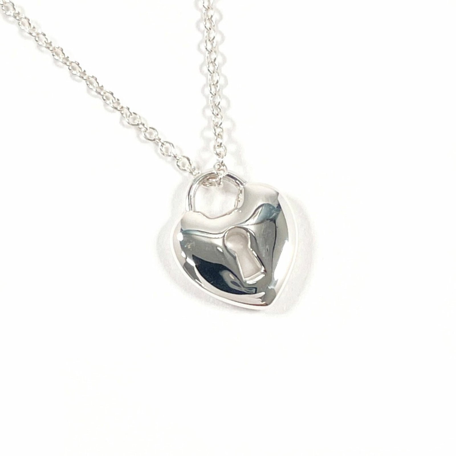 Women's - TIFFANY & Co. Tiffany Lock Heart Necklace - 925 Sterling Silver: Women's - TIFFANY & Co. Tiffany Lock Heart Necklace - 925 Sterling Silver This listing features Women's - TIFFANY & Co. Tiffany Lock Heart Necklace - 925 Sterling Silver. Item specifics are provided b