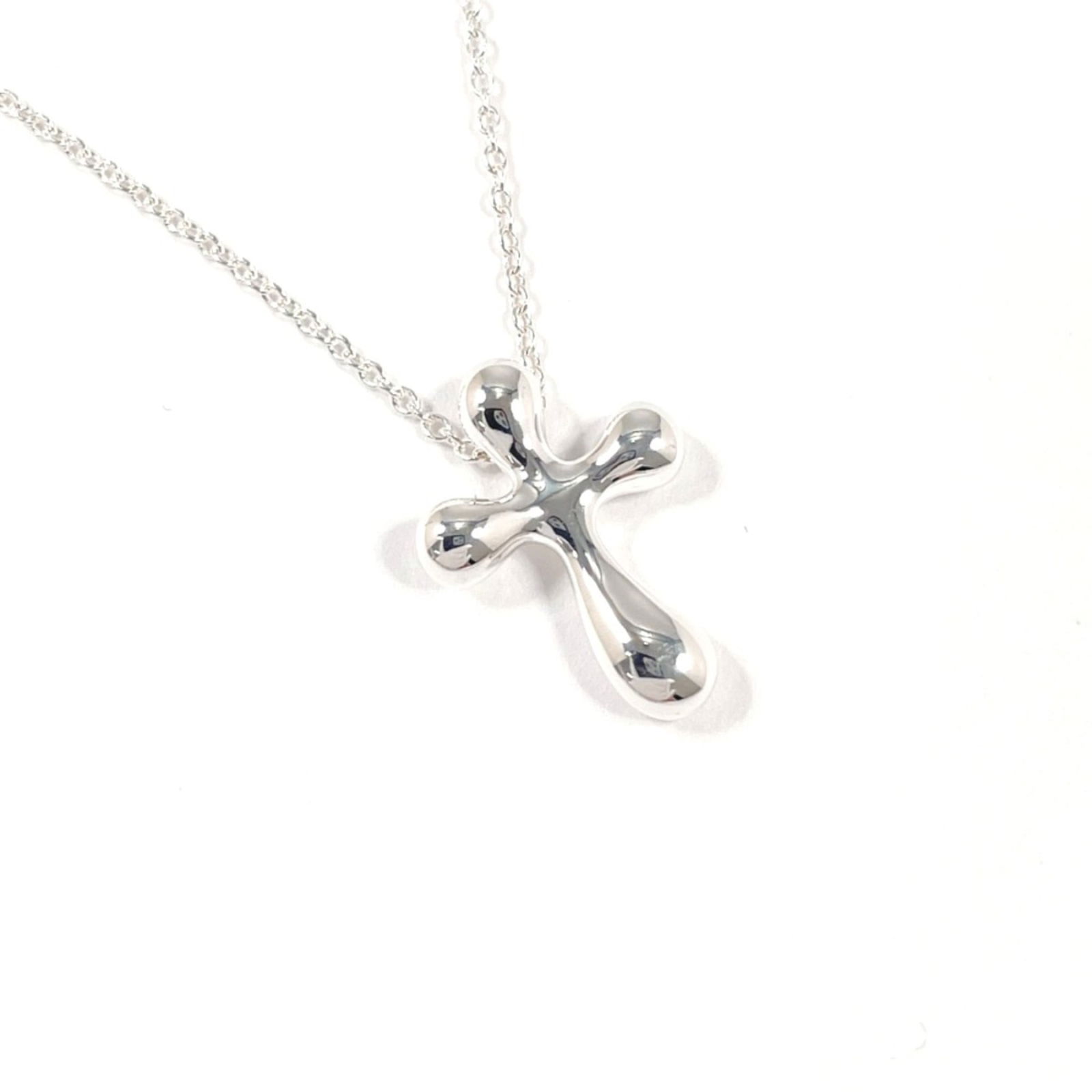 Women TIFFANY & Co. Tiffany Cross Mini Elsa Peretti Necklace in 925 Sterling Silver for: Women TIFFANY & Co. Tiffany Cross Mini Elsa Peretti Necklace in 925 Sterling Silver for This listing features Women TIFFANY & Co. Tiffany Cross Mini Elsa Peretti Necklace in 925 Sterling Silver for. I