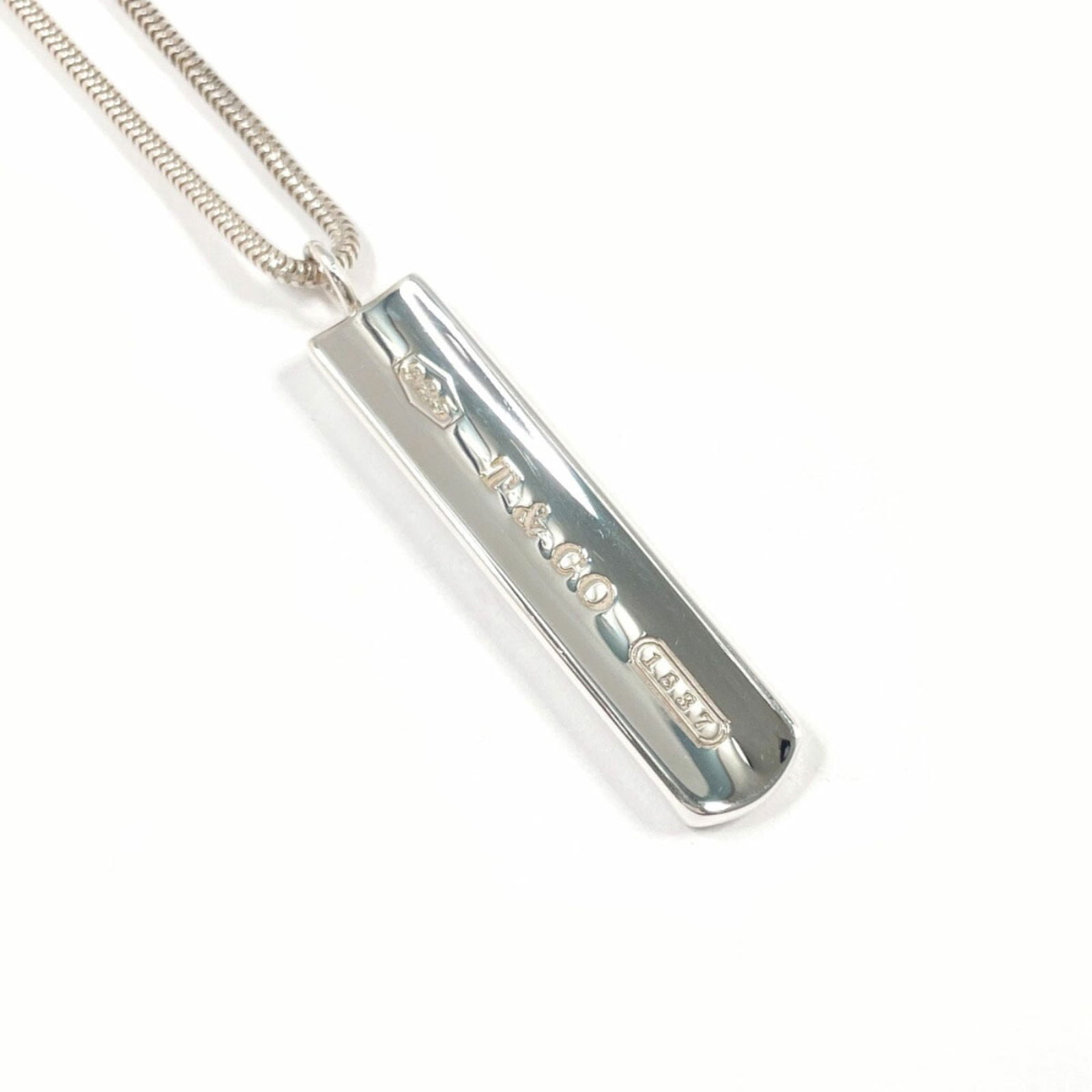 Unisex - TIFFANY & Co. 1837 Bar Pendant Necklace in Sterling Silver: Unisex - TIFFANY & Co. 1837 Bar Pendant Necklace in Sterling Silver This listing features Unisex - TIFFANY & Co. 1837 Bar Pendant Necklace in Sterling Silver. Item specifics are provided below. Item S