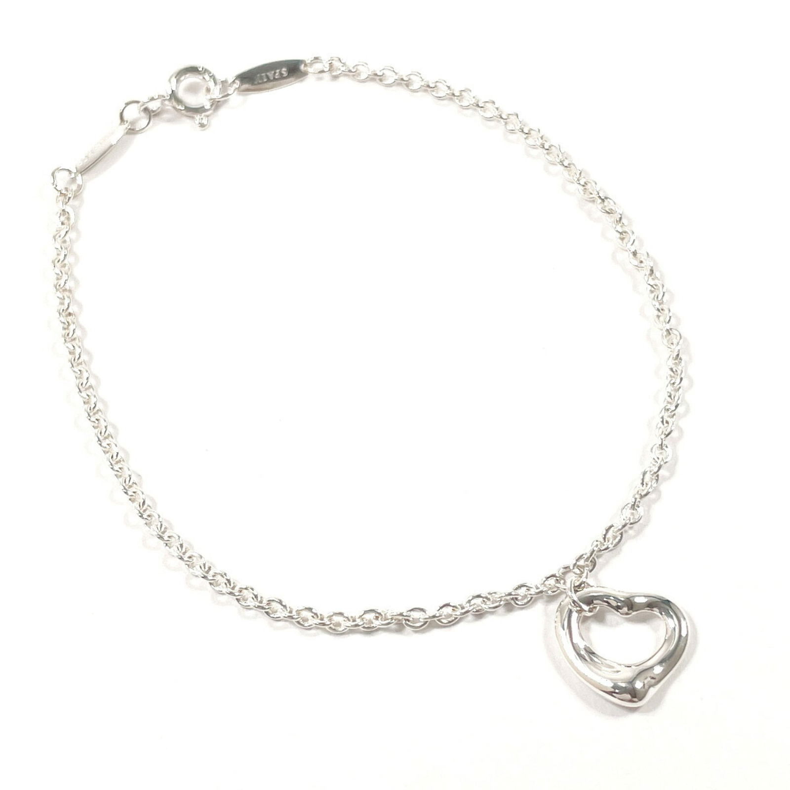 925 Tiffany Charm Bracelet Silver: 925 Tiffany Charm Bracelet Silver This listing features 925 Tiffany Charm Bracelet Silver. Item specifics are provided below. Item Specifics: Brand: Tiffany Type: Charm Bracelet Gender: Women Material