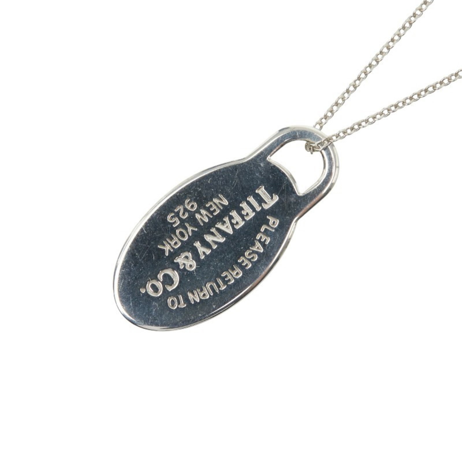 TIFFANY & Co. Return to Oval Tag Necklace in 925 Sterling Silver for Women.: TIFFANY & Co. Return to Oval Tag Necklace in 925 Sterling Silver for Women. This listing features TIFFANY & Co. Return to Oval Tag Necklace in 925 Sterling Silver for Women.. Item specifics are provid