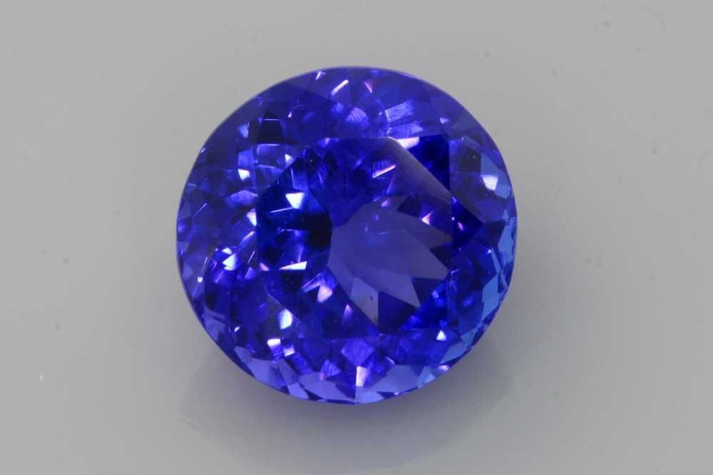 Loose Tanzanite Gemstone - Round 4.21ct Blue EC: Loose Tanzanite Gemstone - Round 4.21ct Blue EC This listing features Loose Tanzanite Gemstone - Round 4.21ct Blue EC. Item specifics are provided below. Item Specifics: Type: Tanzanite Carat: 4.21 Cu