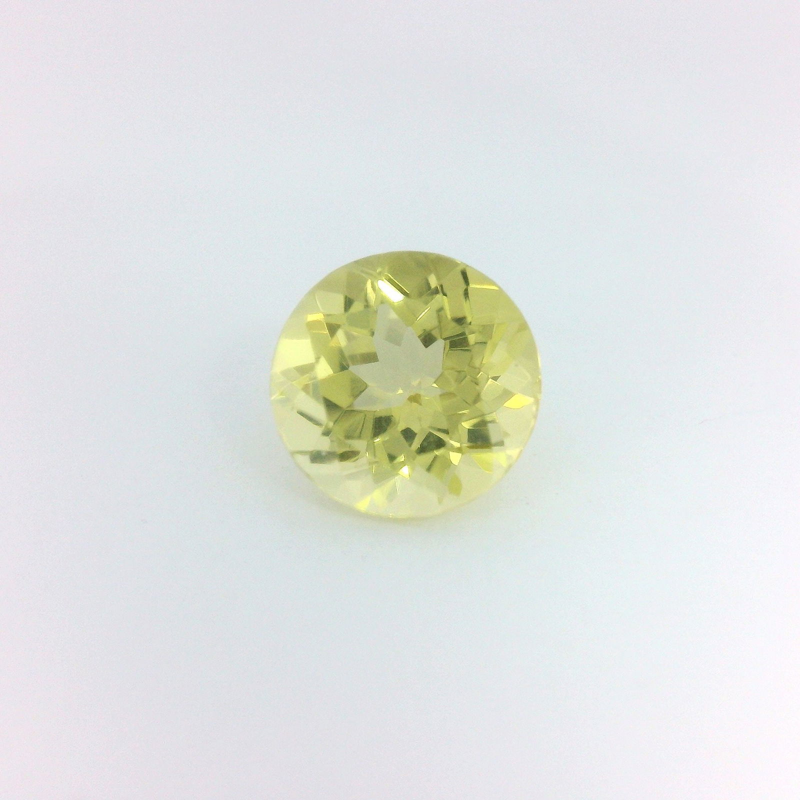 Loose Apatite Gemstone - GSI Round 2.15ct Yellow EC: Loose Apatite Gemstone - GSI Round 2.15ct Yellow EC This listing features Loose Apatite Gemstone - GSI Round 2.15ct Yellow EC. Item specifics are provided below. Item Specifics: Type: Apatite Carat: 2
