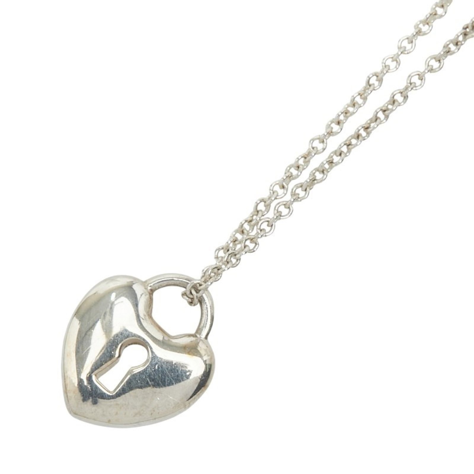 Co. Tiffany Heart Lock Necklace in 925 Sterling Silver for Women. TIFFANY &: Co. Tiffany Heart Lock Necklace in 925 Sterling Silver for Women. TIFFANY & This listing features Co. Tiffany Heart Lock Necklace in 925 Sterling Silver for Women. TIFFANY &. Item specifics are provid