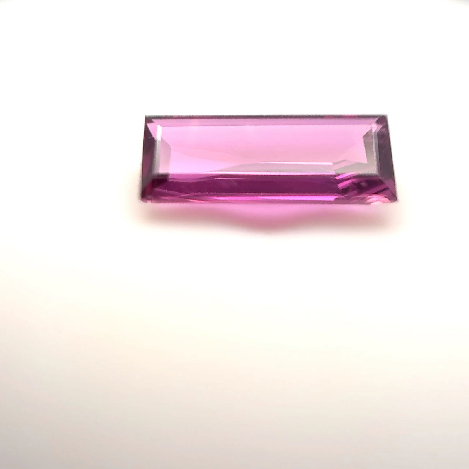 Loose Ruby Gemstone - Baguette 1.12ct Purple EC: Loose Ruby Gemstone - Baguette 1.12ct Purple EC This listing features Loose Ruby Gemstone - Baguette 1.12ct Purple EC. Item specifics are provided below. Item Specifics: Type: Ruby Carat: 1.12 Cut: Fa