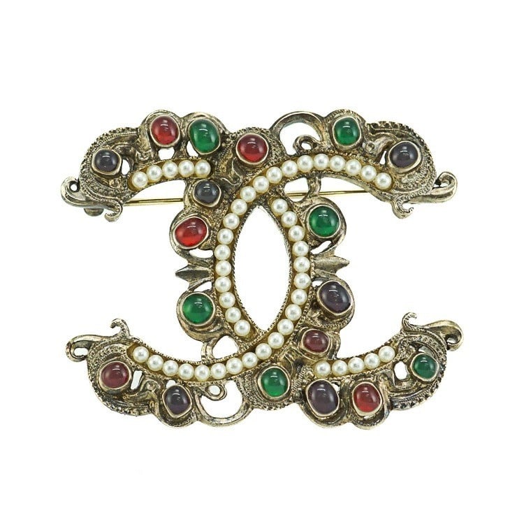 Brooch CHANEL 17S Coco Mark CC Multicolored Gripoix and Faux Pearl Pin: Brooch CHANEL 17S Coco Mark CC Multicolored Gripoix and Faux Pearl Pin This listing features Brooch CHANEL 17S Coco Mark CC Multicolored Gripoix and Faux Pearl Pin. Item specifics are provided below.