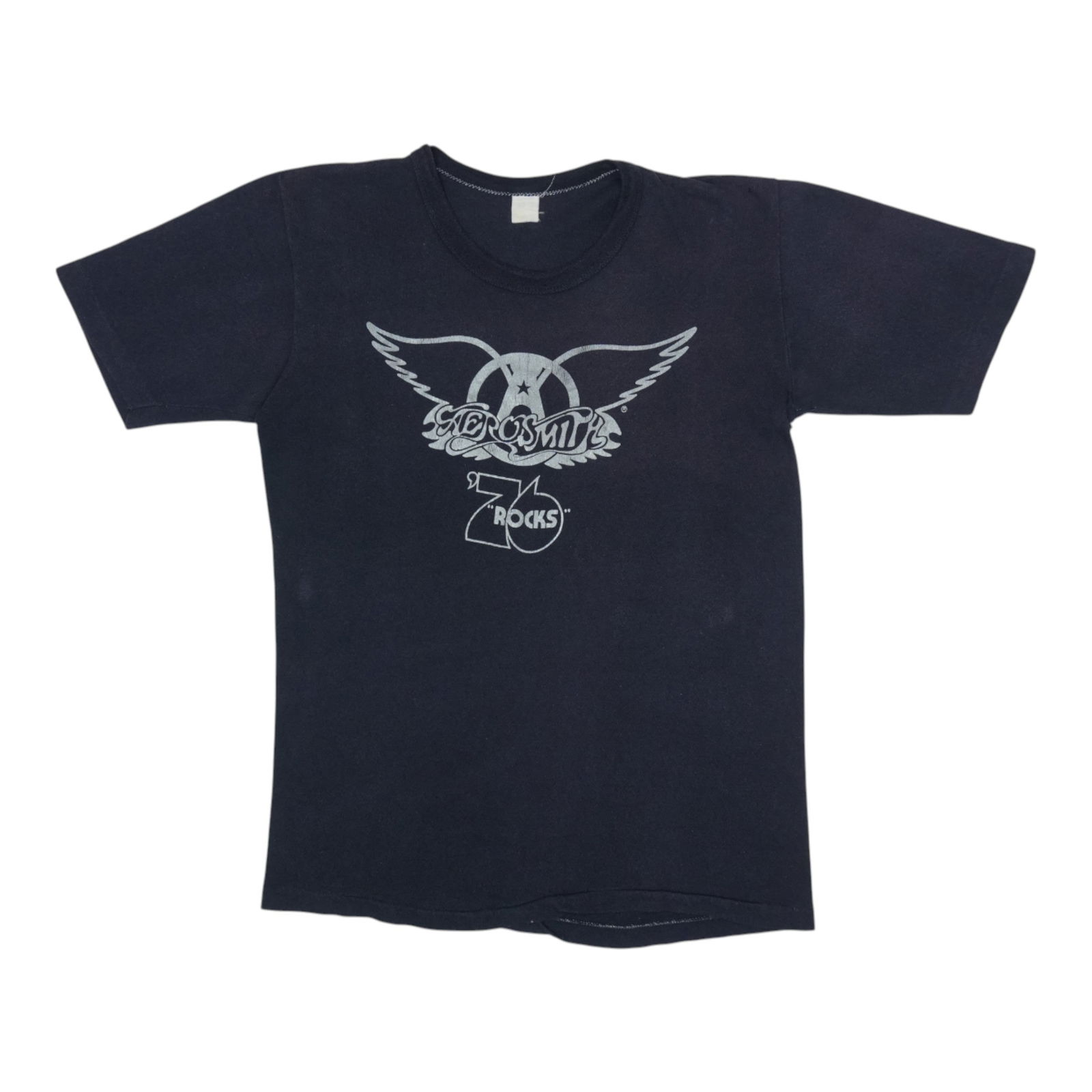 Shirt 1976 Aerosmith Rocks Tour: Shirt 1976 Aerosmith Rocks Tour This listing features Shirt 1976 Aerosmith Rocks Tour. Item specifics are provided below. Item Specifics: Size: Unreadable Tag Size: Unreadable Material: 100% Cotton Co