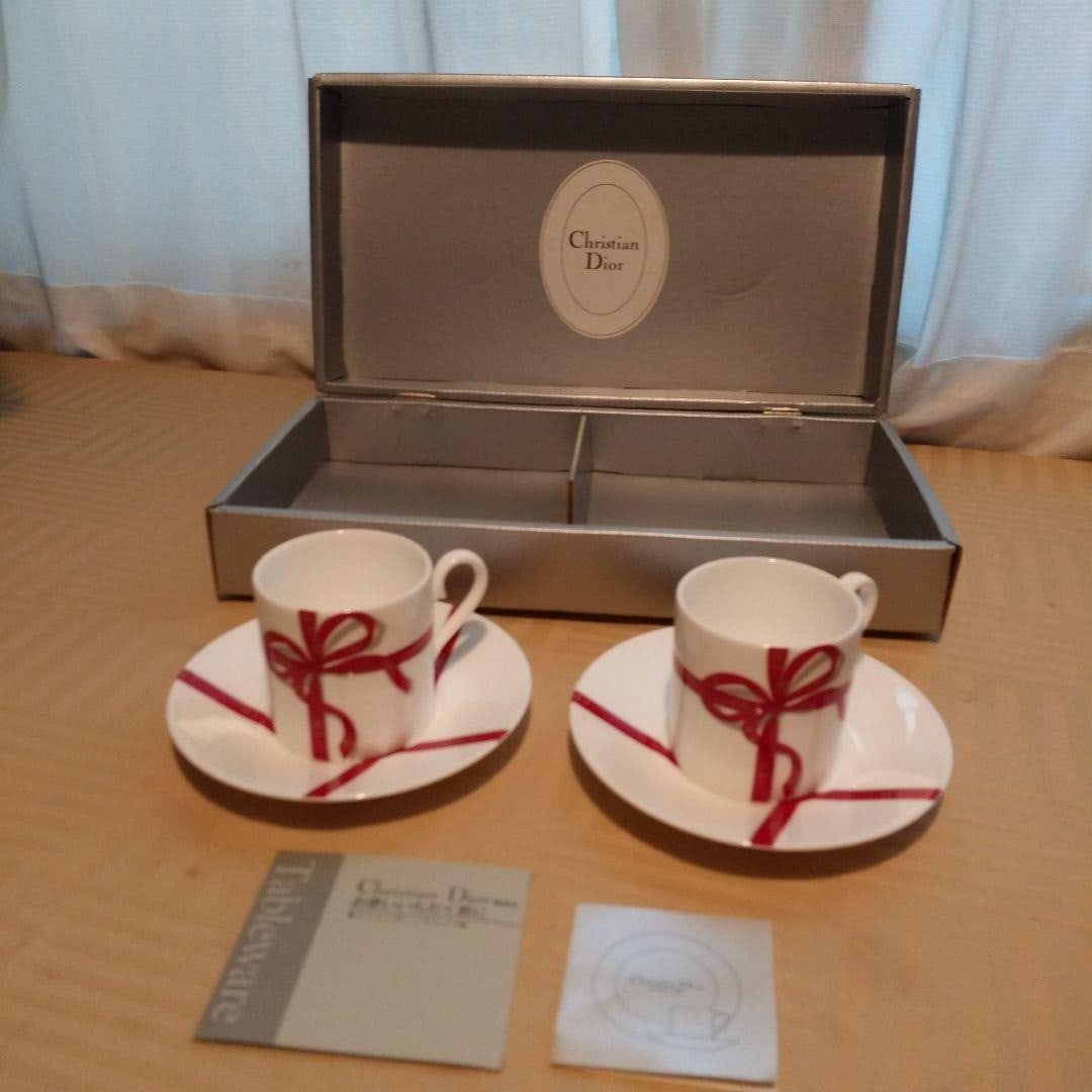 Boxed Christian Dior Ribbon Demitasse Cup Saucer Pair Rare White Red Porcelain: Boxed Christian Dior Ribbon Demitasse Cup Saucer Pair Rare White Red Porcelain This listing features Boxed Christian Dior Ribbon Demitasse Cup Saucer Pair Rare White Red Porcelain. Item specifics are