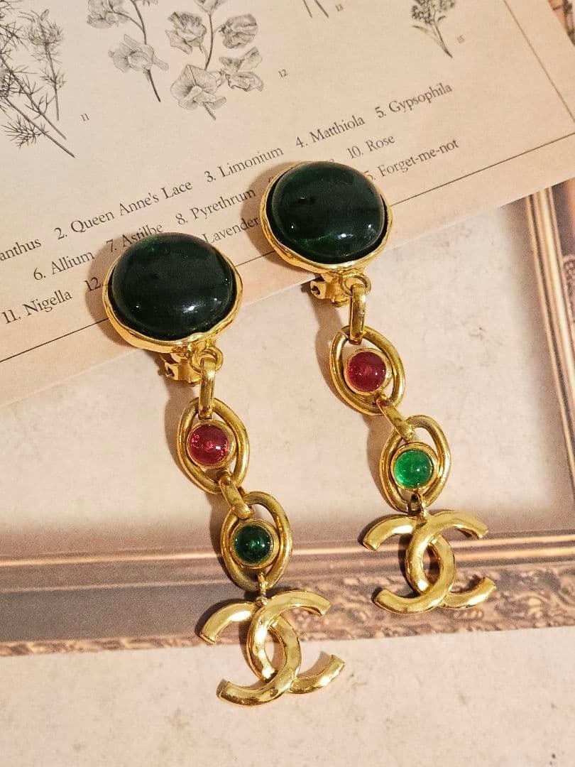 Rare Vintage CHANEL 95P Coco Mark CC Colored Stone Dangle Long Earring in: Rare Vintage CHANEL 95P Coco Mark CC Colored Stone Dangle Long Earring in This listing features Rare Vintage CHANEL 95P Coco Mark CC Colored Stone Dangle Long Earring in. Item specifics are provided b